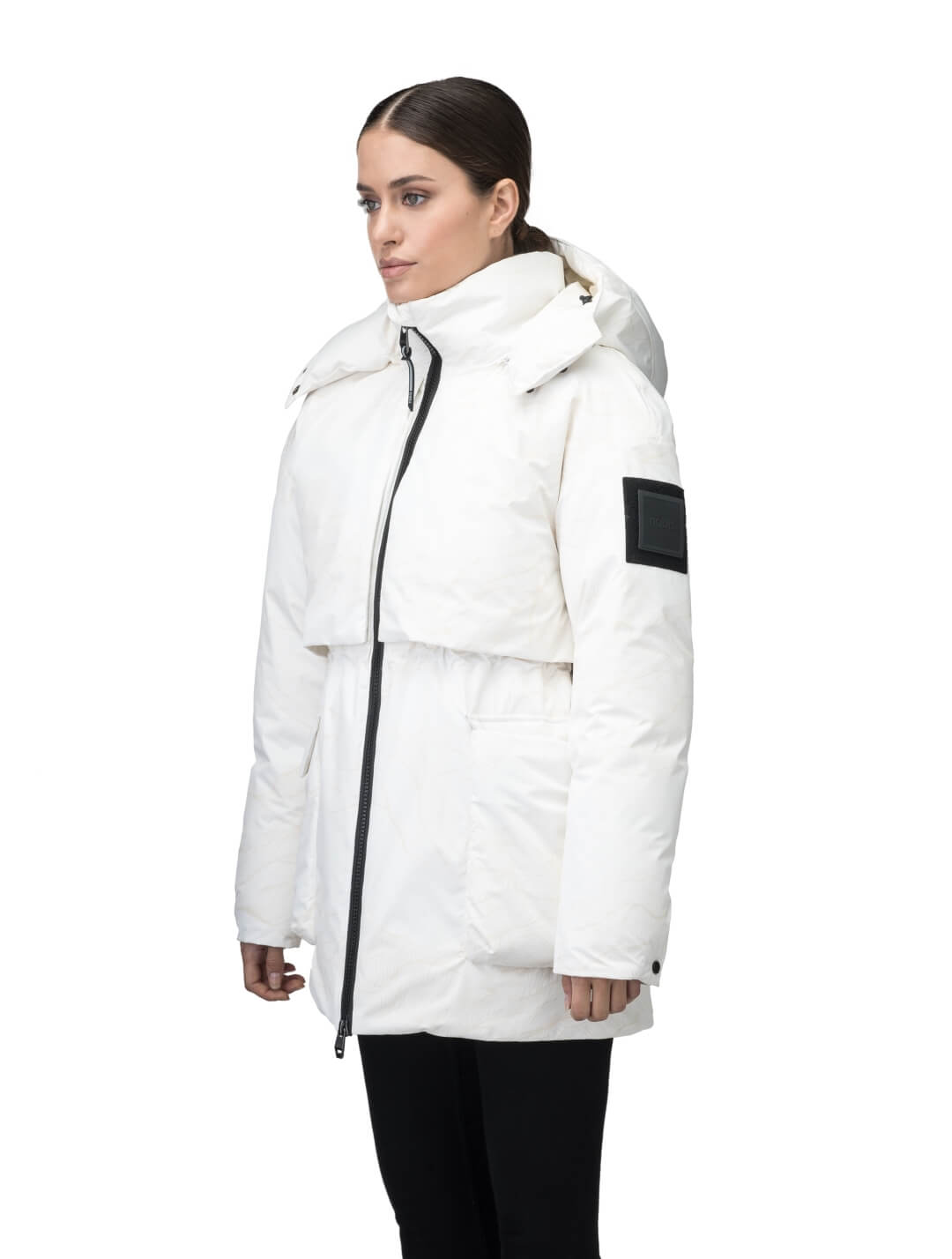 Haelyn Ladies Short Utility Parka in thigh length, 3-Ply Micro Denier fabrication, Premium Canadian White Duck Down insulation, removable down-filled hood, two-way centre front zipper, hidden adjustable cord at waist, adjustable snap cuffs, and four exterior patch pockets at front, in Wheat Desert