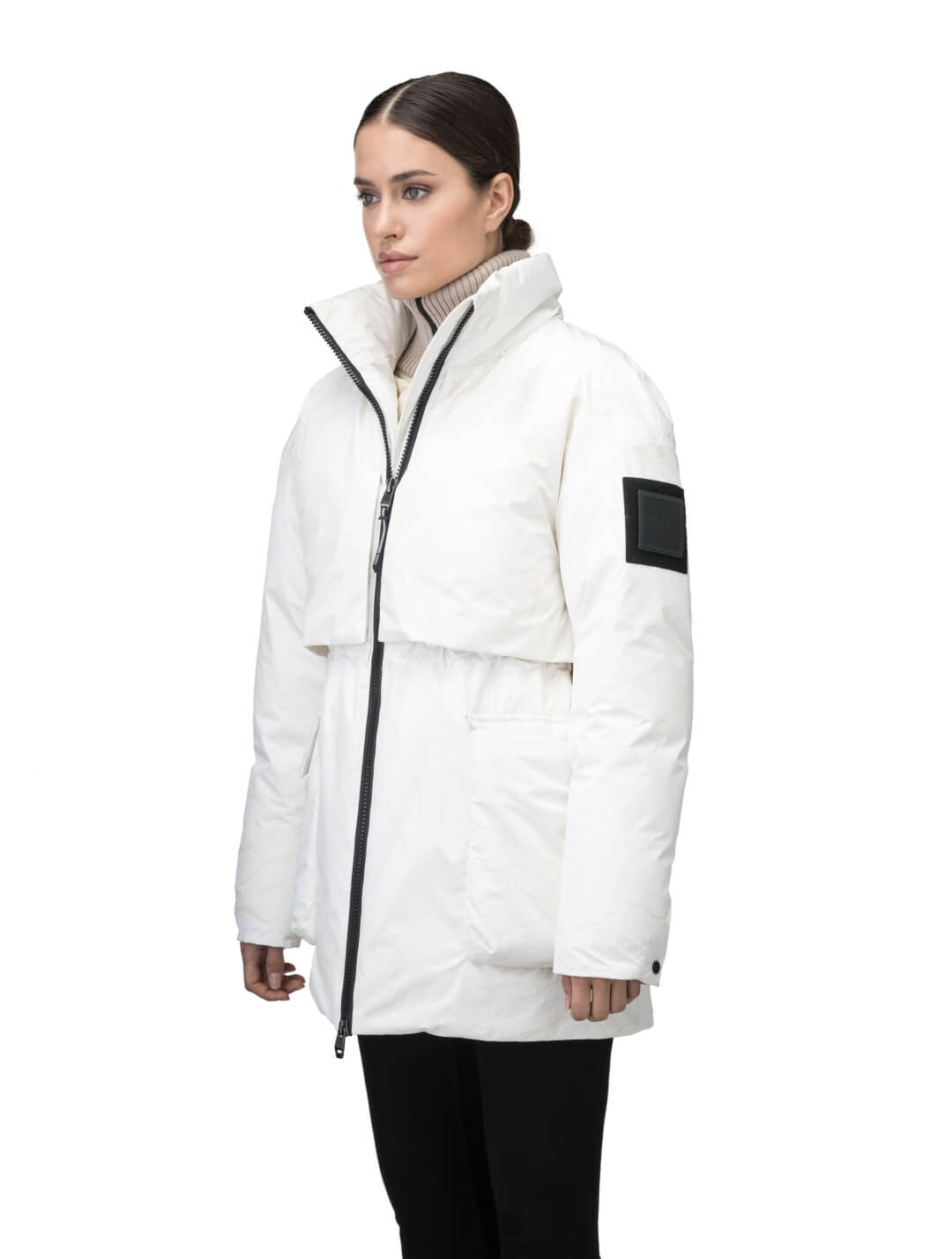 Haelyn Ladies Short Utility Parka in thigh length, 3-Ply Micro Denier fabrication, Premium Canadian White Duck Down insulation, removable down-filled hood, two-way centre front zipper, hidden adjustable cord at waist, adjustable snap cuffs, and four exterior patch pockets at front, in Wheat Desert