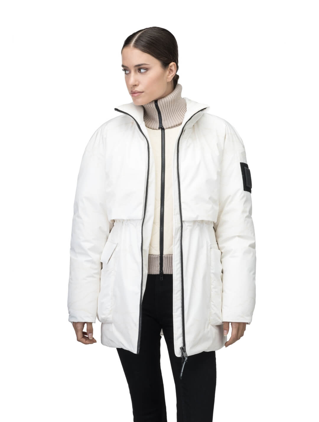 Haelyn Ladies Short Utility Parka in thigh length, 3-Ply Micro Denier fabrication, Premium Canadian White Duck Down insulation, removable down-filled hood, two-way centre front zipper, hidden adjustable cord at waist, adjustable snap cuffs, and four exterior patch pockets at front, in Wheat Desert