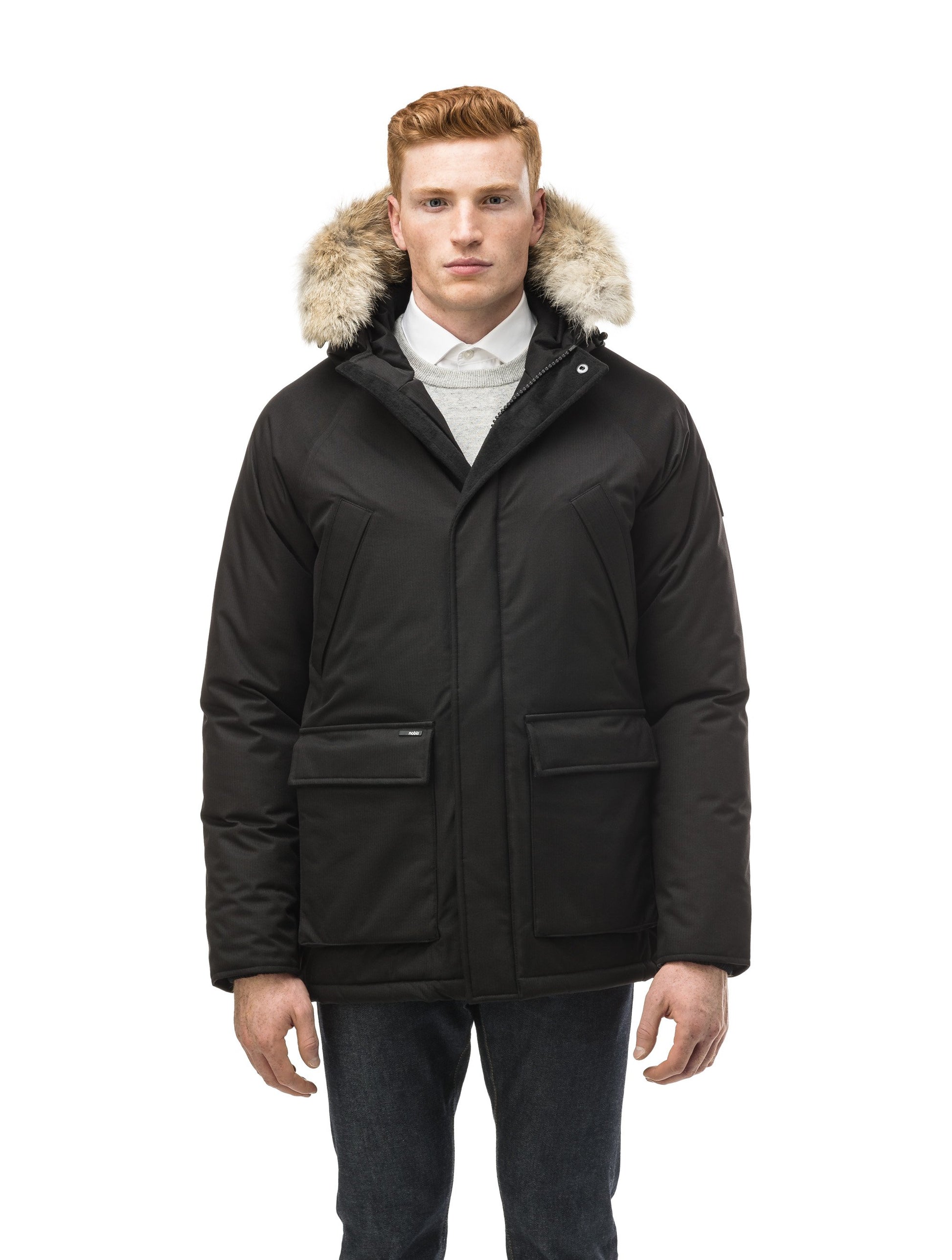 Men's waist length down filled jacket with two front pockets with magnetic closure and a removable fur trim on the hood in CH Black