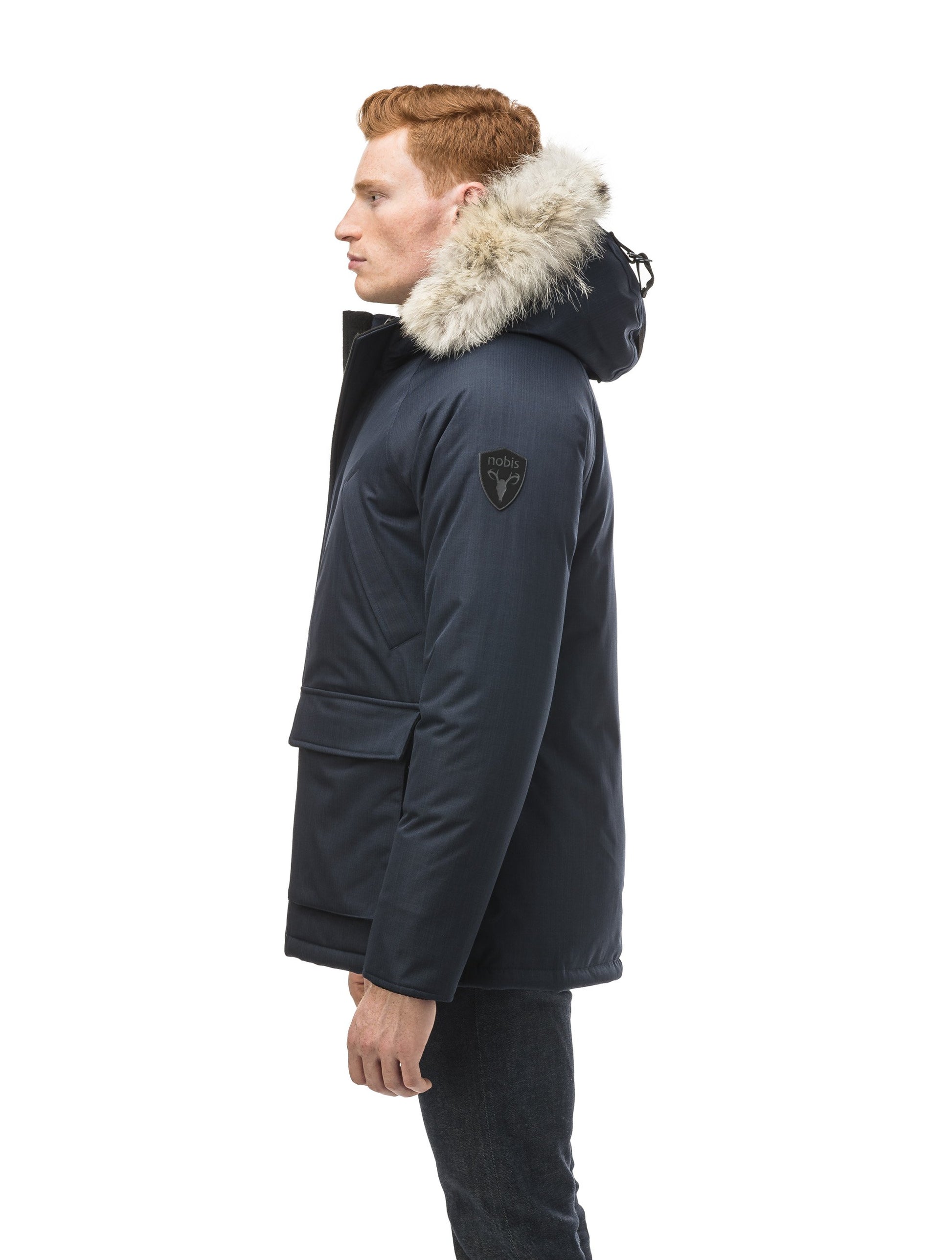 Men's waist length down filled jacket with two front pockets with magnetic closure and a removable fur trim on the hood in CH Navy