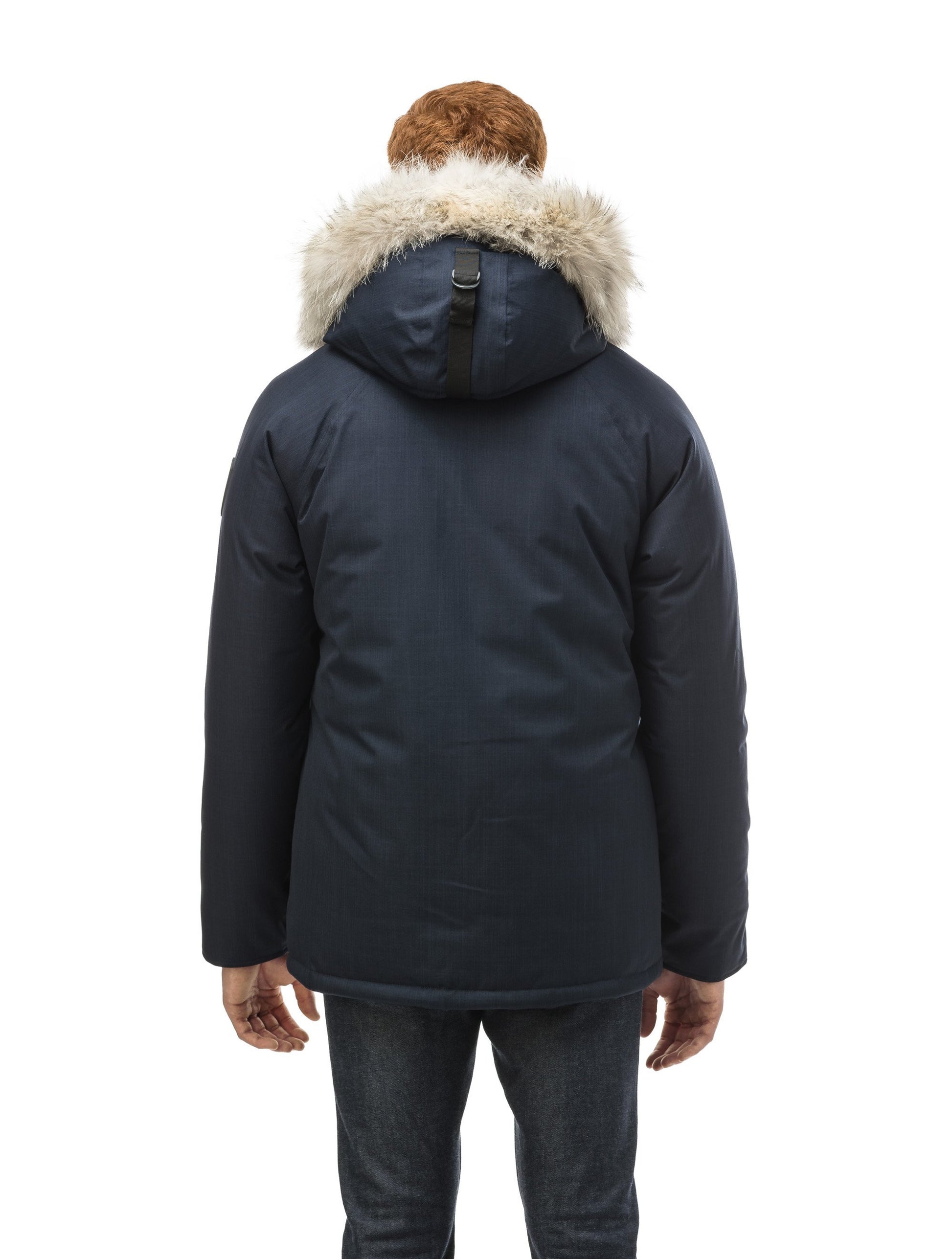 Men's waist length down filled jacket with two front pockets with magnetic closure and a removable fur trim on the hood in CH Navy