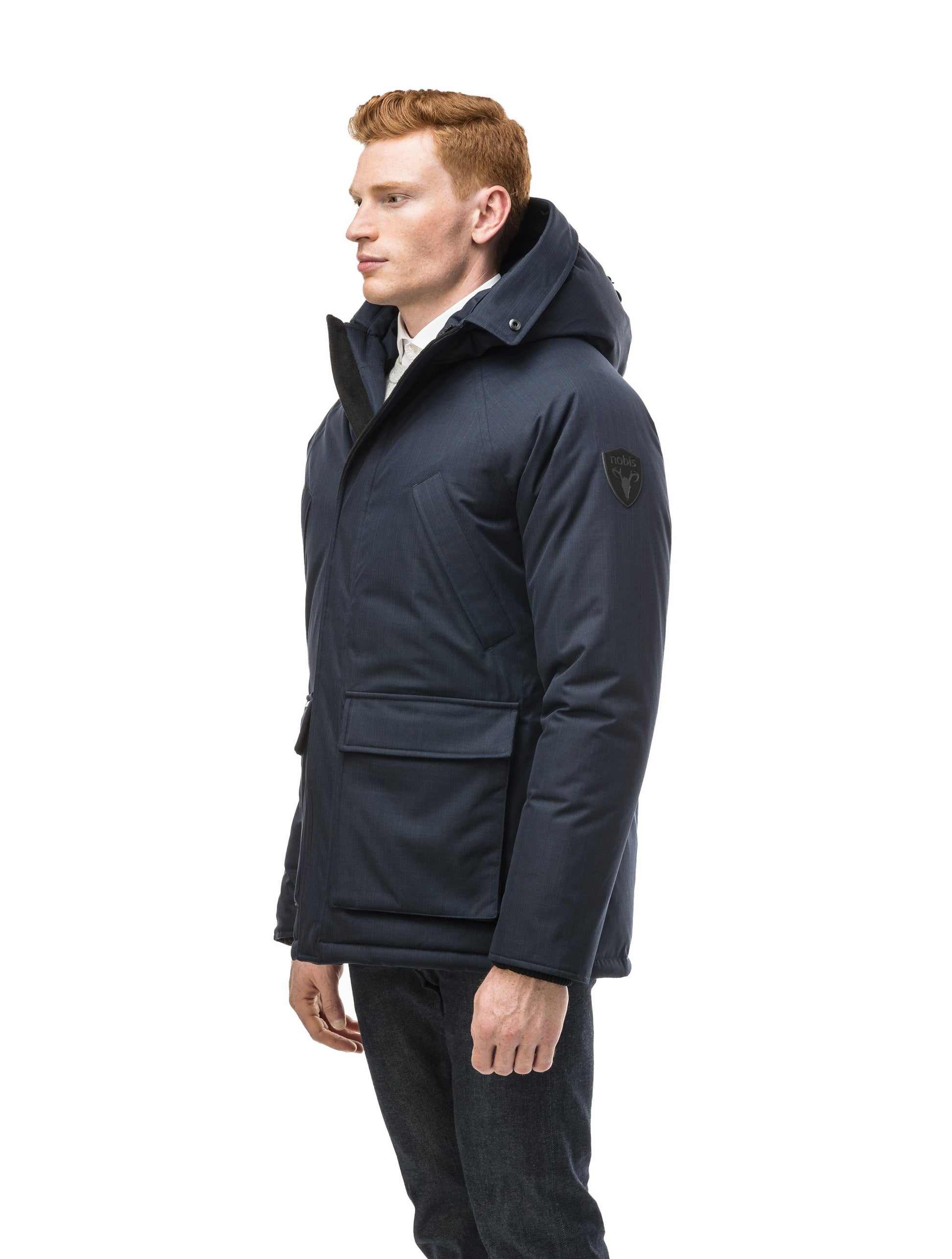 Men's waist length down filled jacket with two front pockets with magnetic closure and a removable fur trim on the hood in CH Navy