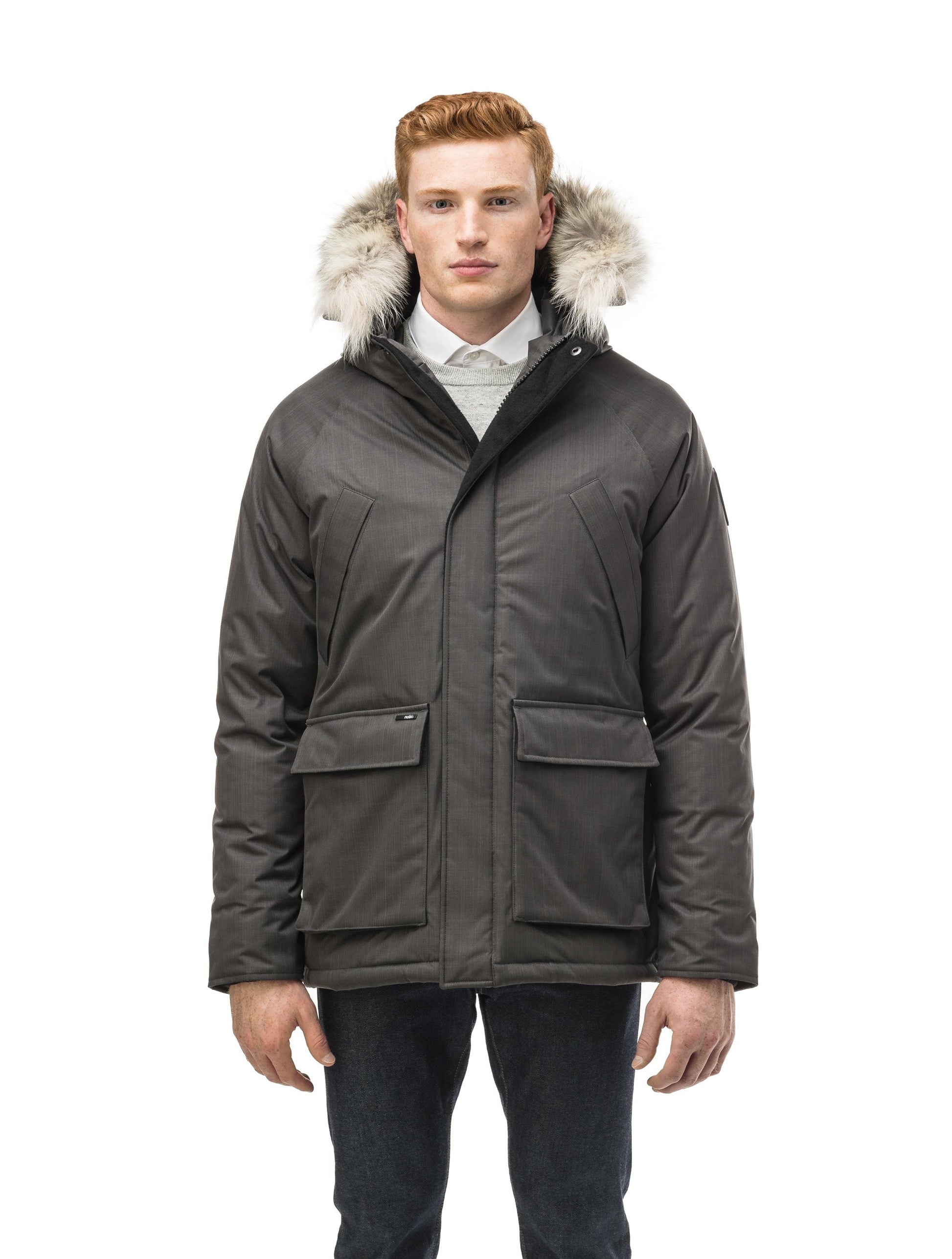 Men's waist length down filled jacket with two front pockets with magnetic closure and a removable fur trim on the hood in CH Steel Grey