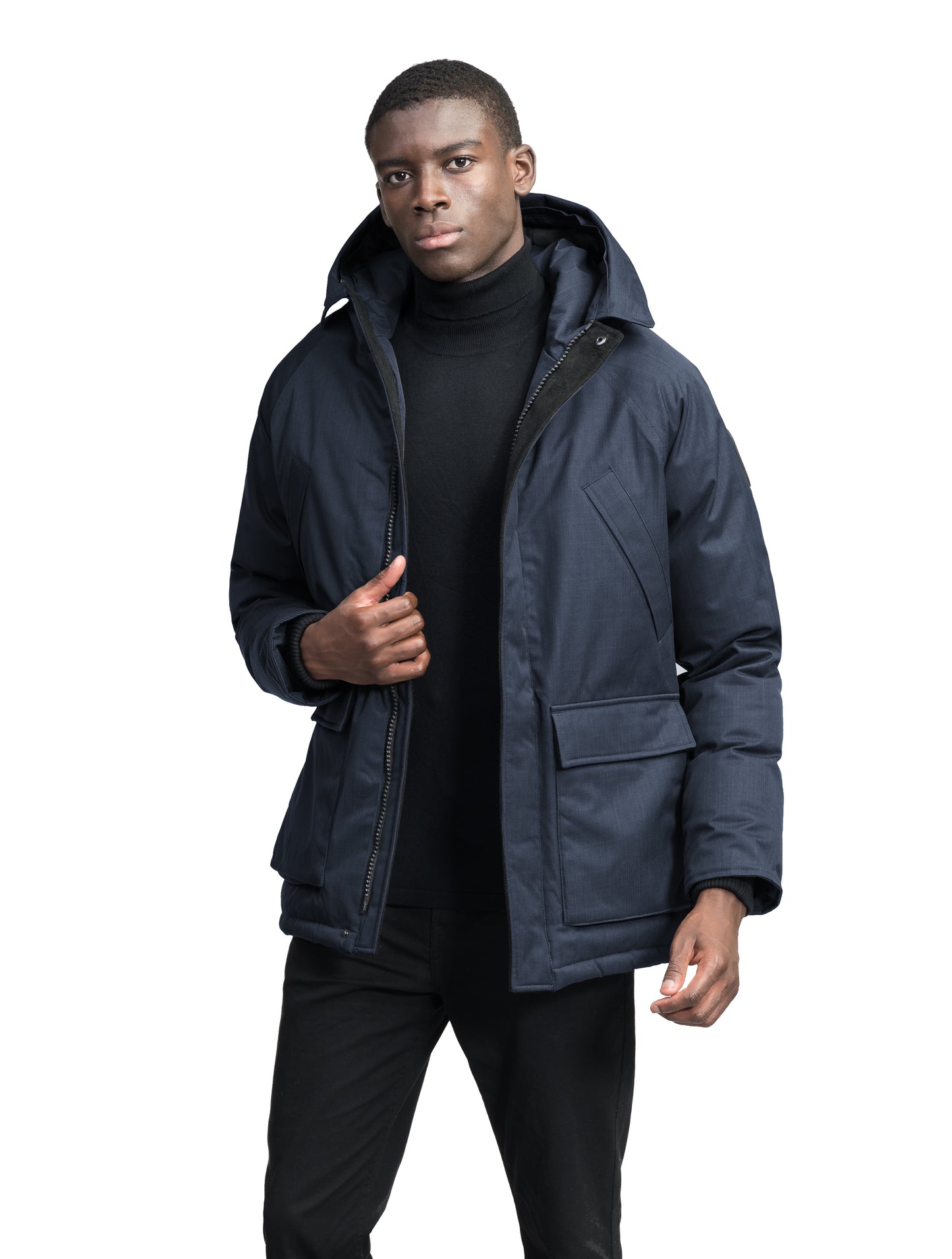 Heritage Furless Men's Parka in hip length, Canadian white duck down insulation, non-removable hood, front zipper with magnetic placket, chest hand warmer pockets, waist flap pockets, and elastic cuffs, in Navy