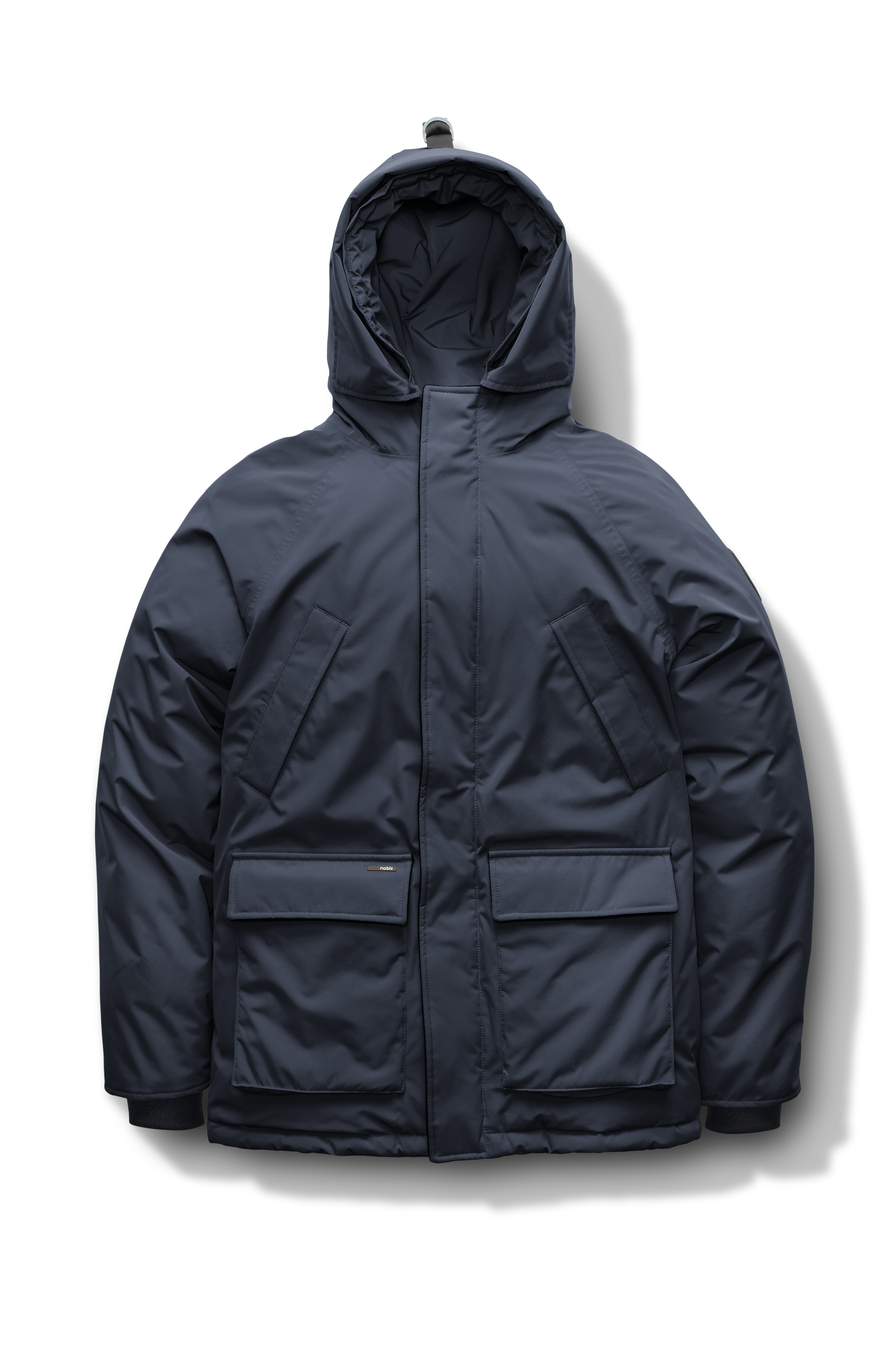 Heritage Furless Men's Parka in hip length, Canadian white duck down insulation, non-removable hood, front zipper with magnetic placket, chest hand warmer pockets, waist flap pockets, and elastic cuffs, in Navy