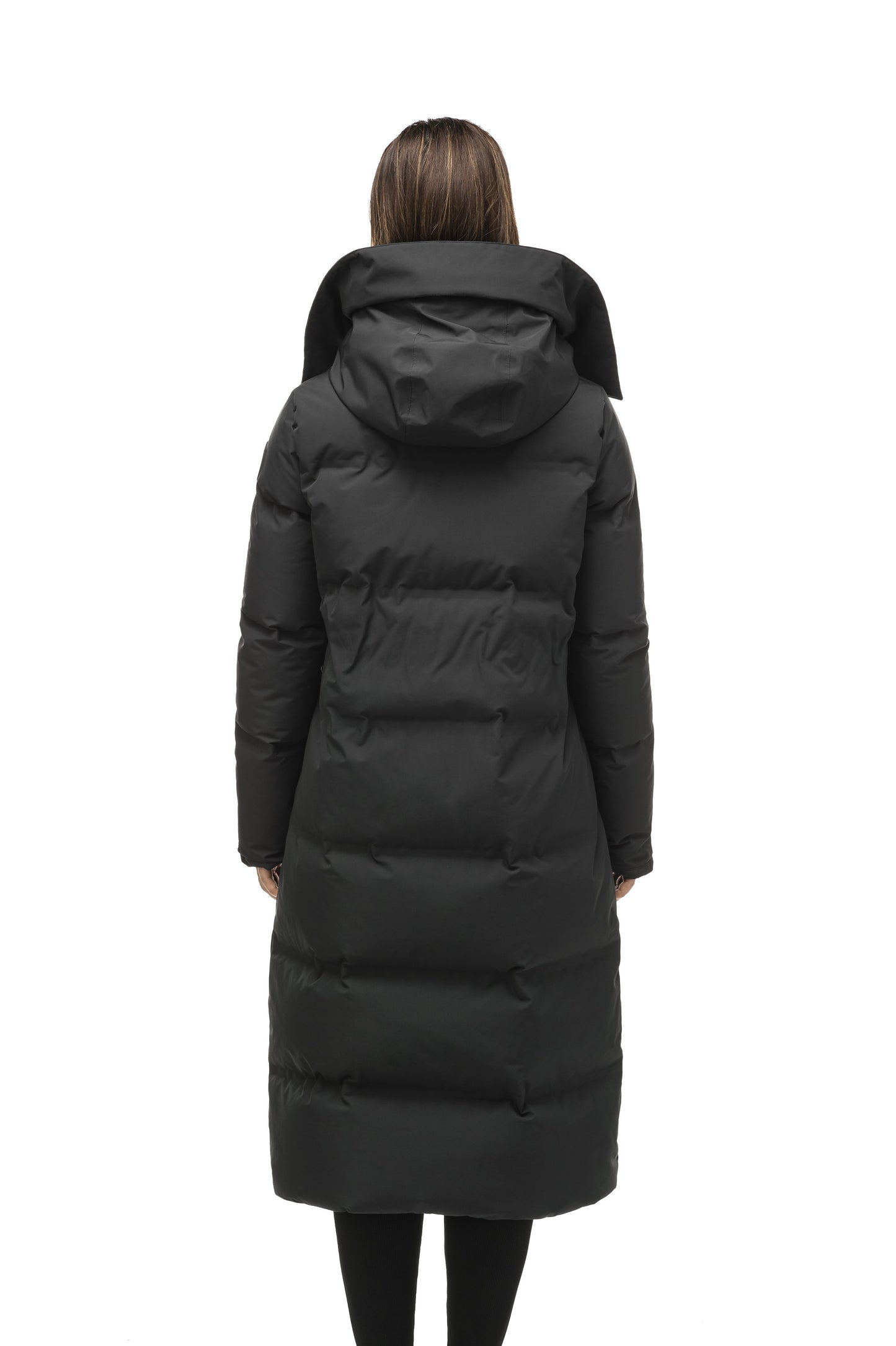 Women's ankle length puffer jacket with a minimalist modern design,ÃƒÆ’Ã†â€™Ãƒâ€ Ã¢â‚¬â„¢ÃƒÆ’Ã¢â‚¬Â ÃƒÂ¢Ã¢â€šÂ¬Ã¢â€žÂ¢ÃƒÆ’Ã†â€™Ãƒâ€šÃ‚Â¢ÃƒÆ’Ã‚Â¢ÃƒÂ¢Ã¢â€šÂ¬Ã…Â¡Ãƒâ€šÃ‚Â¬ÃƒÆ’Ã¢â‚¬Â¦Ãƒâ€šÃ‚Â¡ÃƒÆ’Ã†â€™Ãƒâ€ Ã¢â‚¬â„¢ÃƒÆ’Ã‚Â¢ÃƒÂ¢Ã¢â‚¬Å¡Ã‚Â¬Ãƒâ€¦Ã‚Â¡ÃƒÆ’Ã†â€™ÃƒÂ¢Ã¢â€šÂ¬Ã…Â¡ÃƒÆ’Ã¢â‚¬Å¡Ãƒâ€šÃ‚Â featuring an exposed zipper, and seamless puffer channels in Black