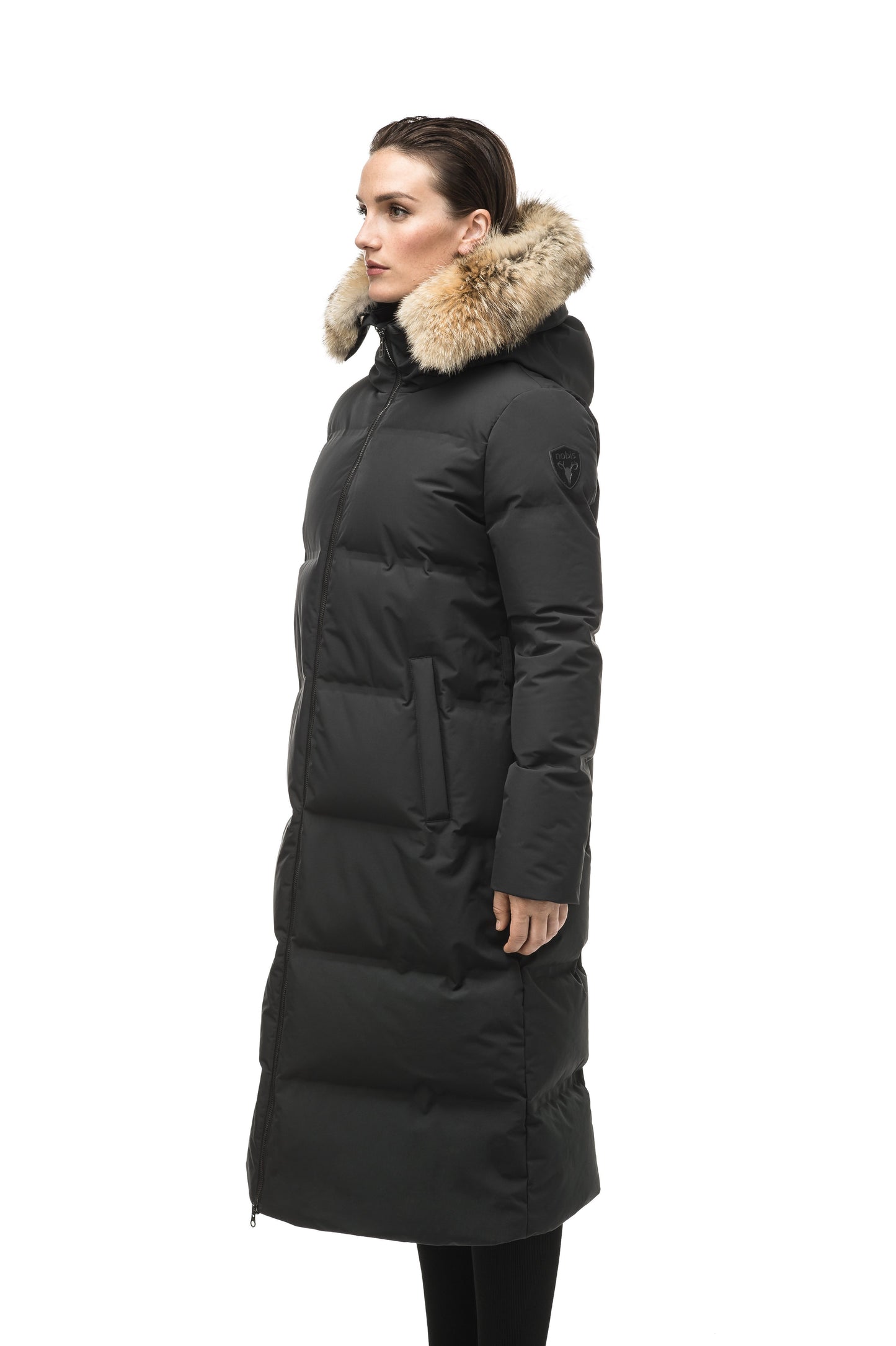 Women's ankle length puffer jacket with a minimalist modern design,ÃƒÆ’Ã†â€™Ãƒâ€ Ã¢â‚¬â„¢ÃƒÆ’Ã¢â‚¬Â ÃƒÂ¢Ã¢â€šÂ¬Ã¢â€žÂ¢ÃƒÆ’Ã†â€™Ãƒâ€šÃ‚Â¢ÃƒÆ’Ã‚Â¢ÃƒÂ¢Ã¢â€šÂ¬Ã…Â¡Ãƒâ€šÃ‚Â¬ÃƒÆ’Ã¢â‚¬Â¦Ãƒâ€šÃ‚Â¡ÃƒÆ’Ã†â€™Ãƒâ€ Ã¢â‚¬â„¢ÃƒÆ’Ã‚Â¢ÃƒÂ¢Ã¢â‚¬Å¡Ã‚Â¬Ãƒâ€¦Ã‚Â¡ÃƒÆ’Ã†â€™ÃƒÂ¢Ã¢â€šÂ¬Ã…Â¡ÃƒÆ’Ã¢â‚¬Å¡Ãƒâ€šÃ‚Â featuring an exposed zipper, and seamless puffer channels in Black