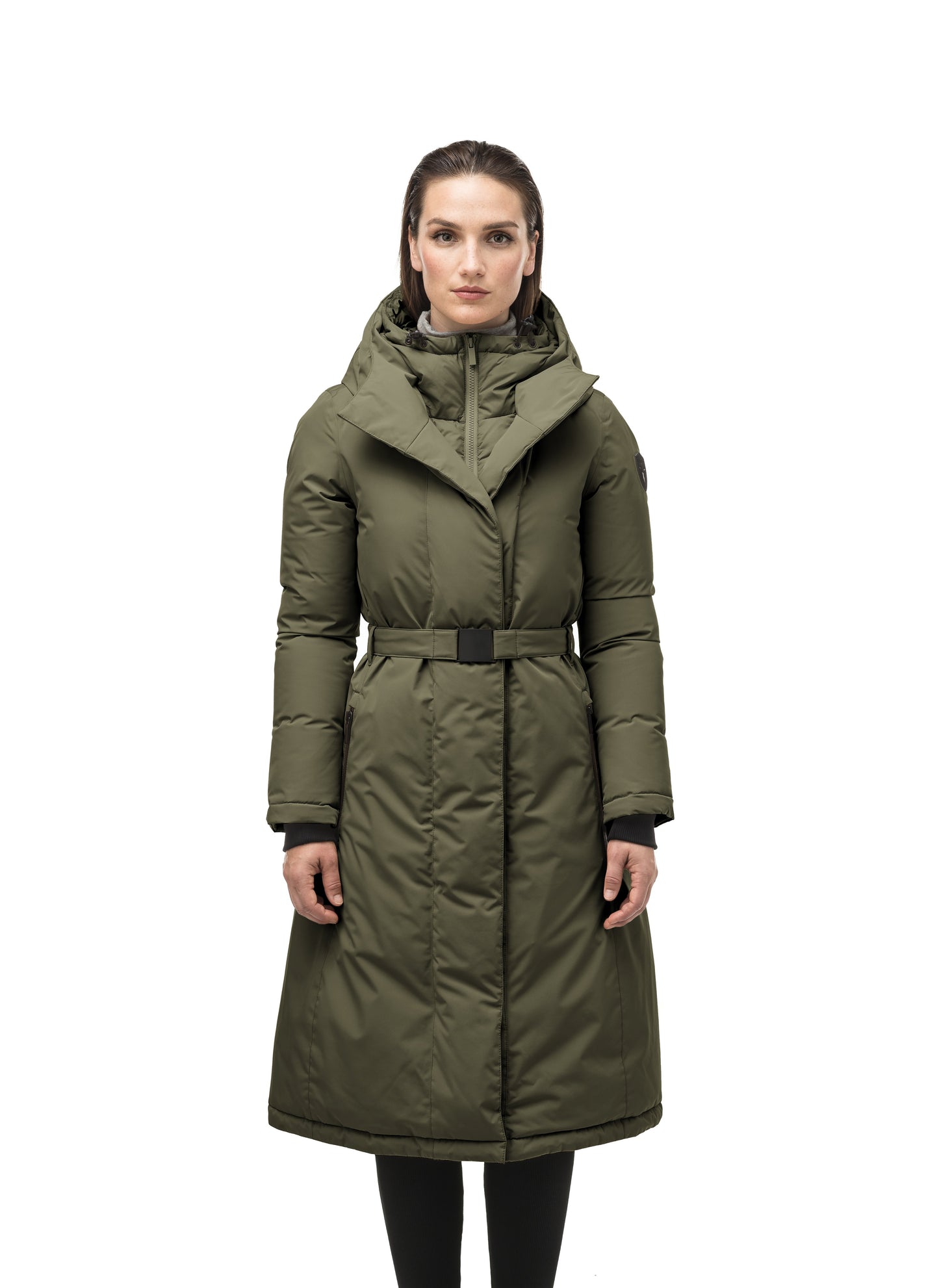 Long calf length hooded women's winter parka with an inner hip length closure, exterior hem length zipper and magentic placket in Fatigue