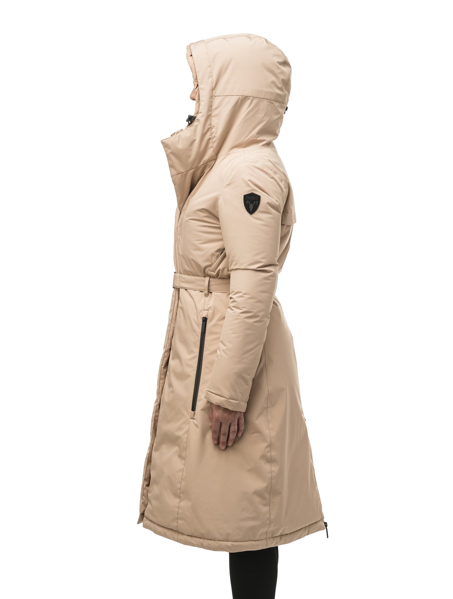 Long calf length hooded women's winter parka with an inner hip length closure, exterior hem length zipper and magentic placket in Fawn