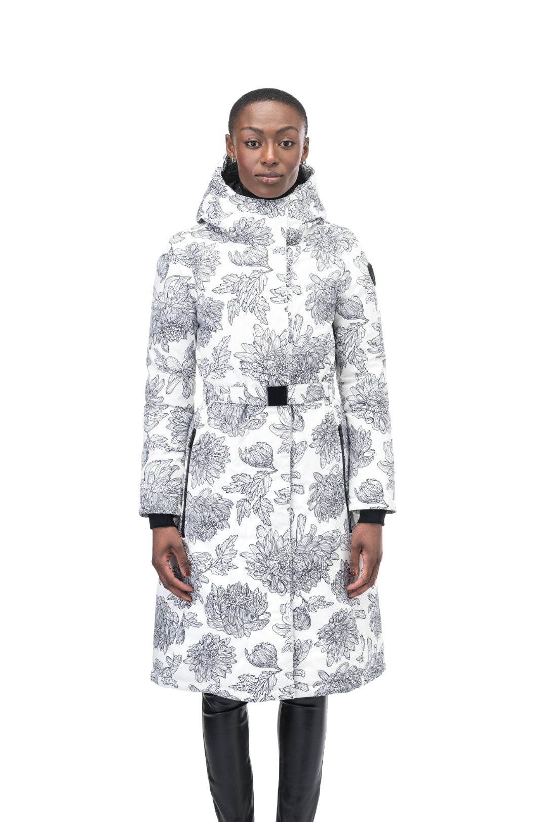 Long calf length hooded women's winter parka with an inner hip length closure, exterior hem length zipper and magnetic placket in White Floral