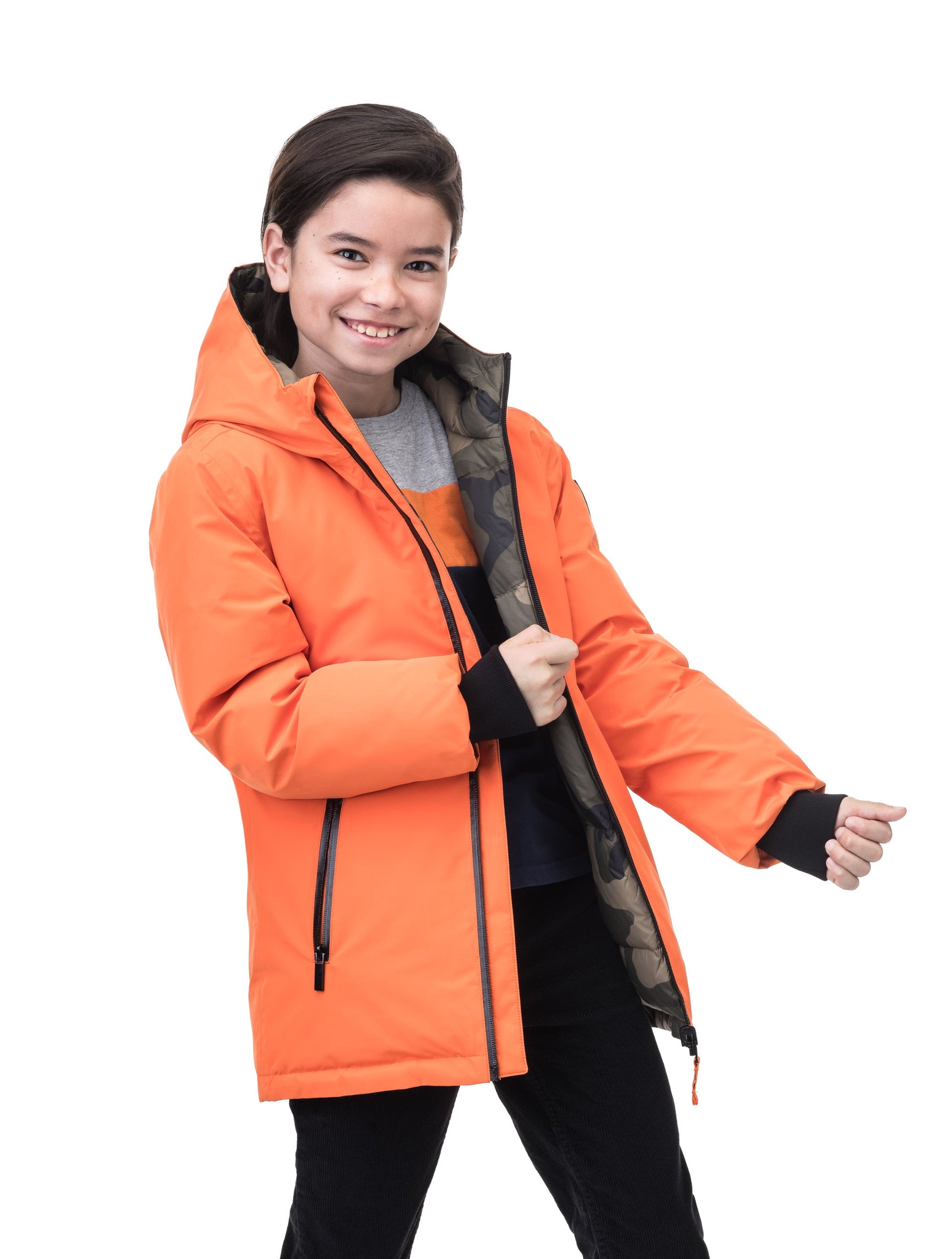 Kids' reversible knee length, down filled parka with waterproof finish in Atomic/Camo