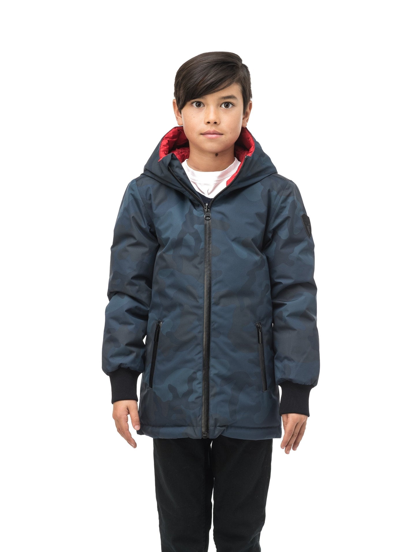 Kids' reversible knee length, down filled parka with waterproof finish in Navy Camo/Vermillion