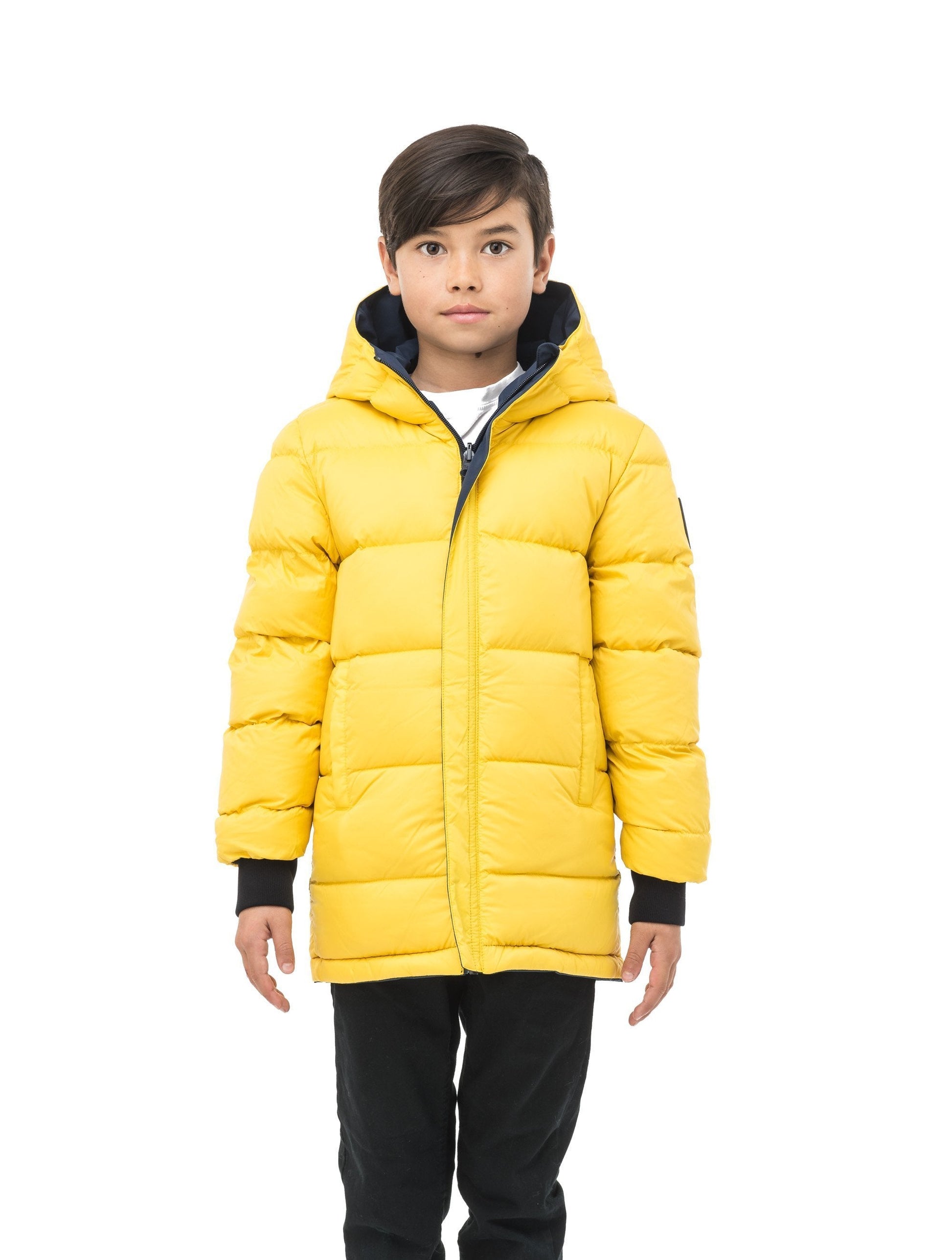 Kids' reversible knee length, down filled parka with waterproof finish in Marine/Citron