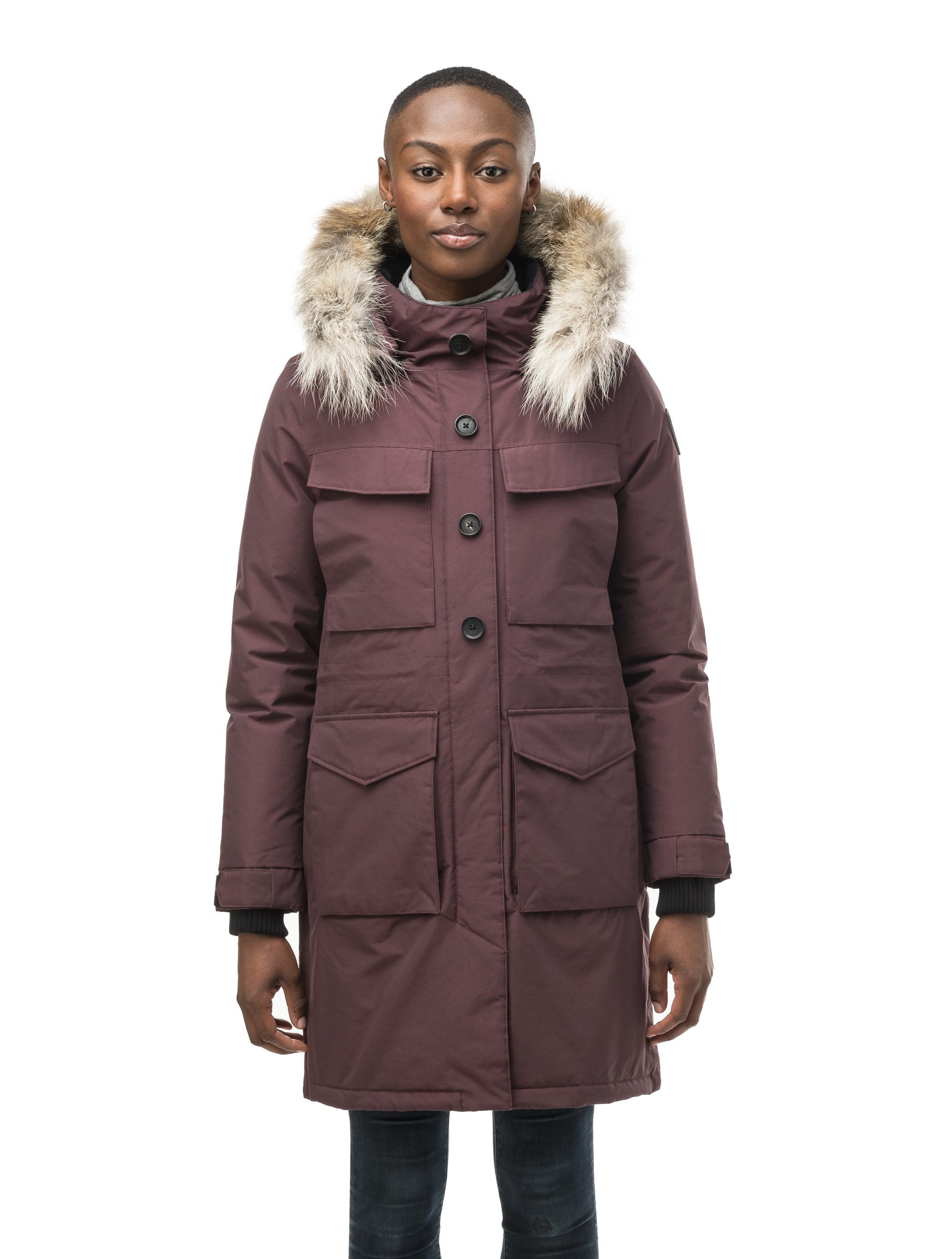 Women's knee length down filled parka with two chest patch pockets and two waist patch pockets in Burgundy