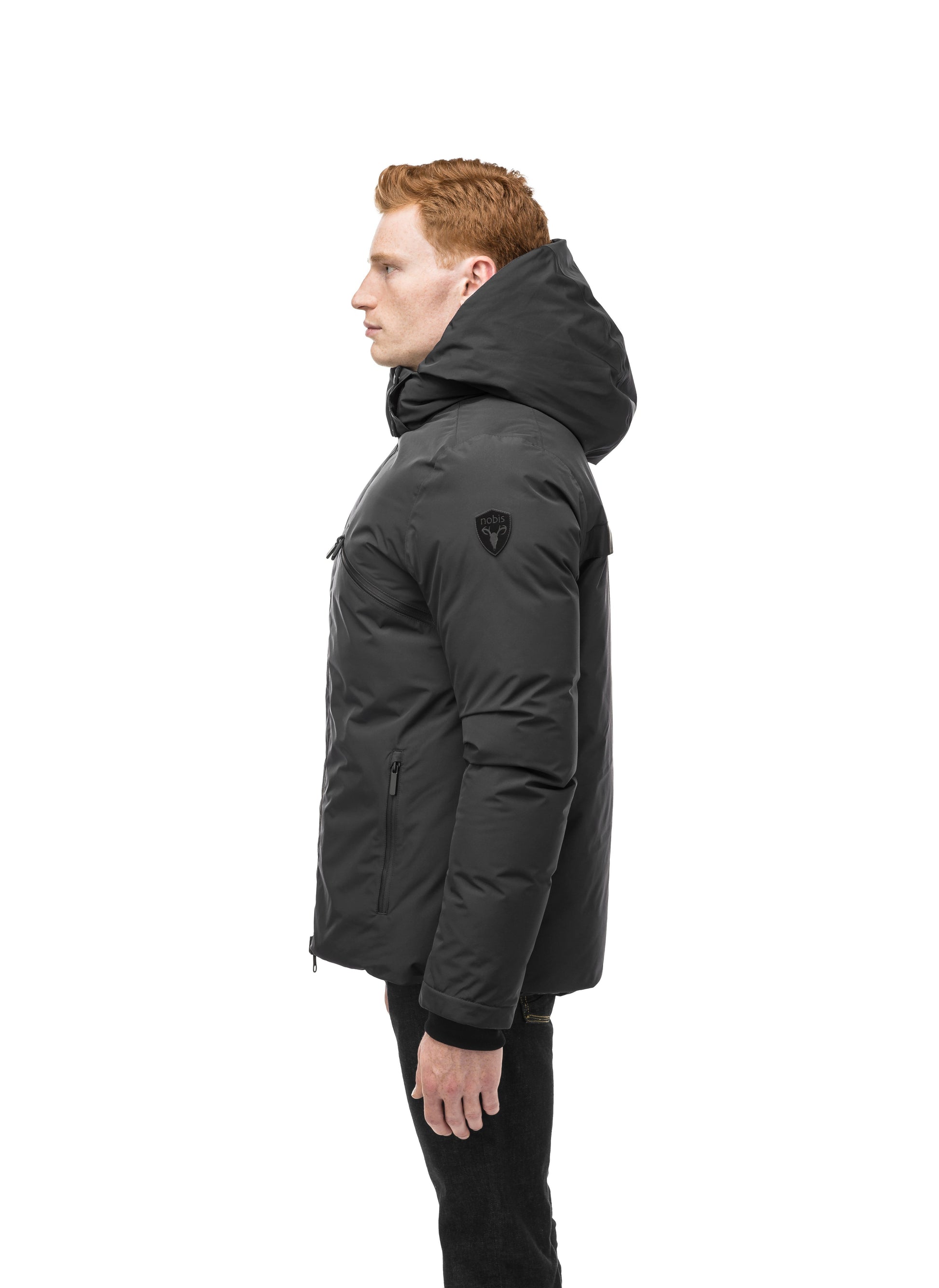 Hip length, reversible men's down filled jacket with removable hood in Black