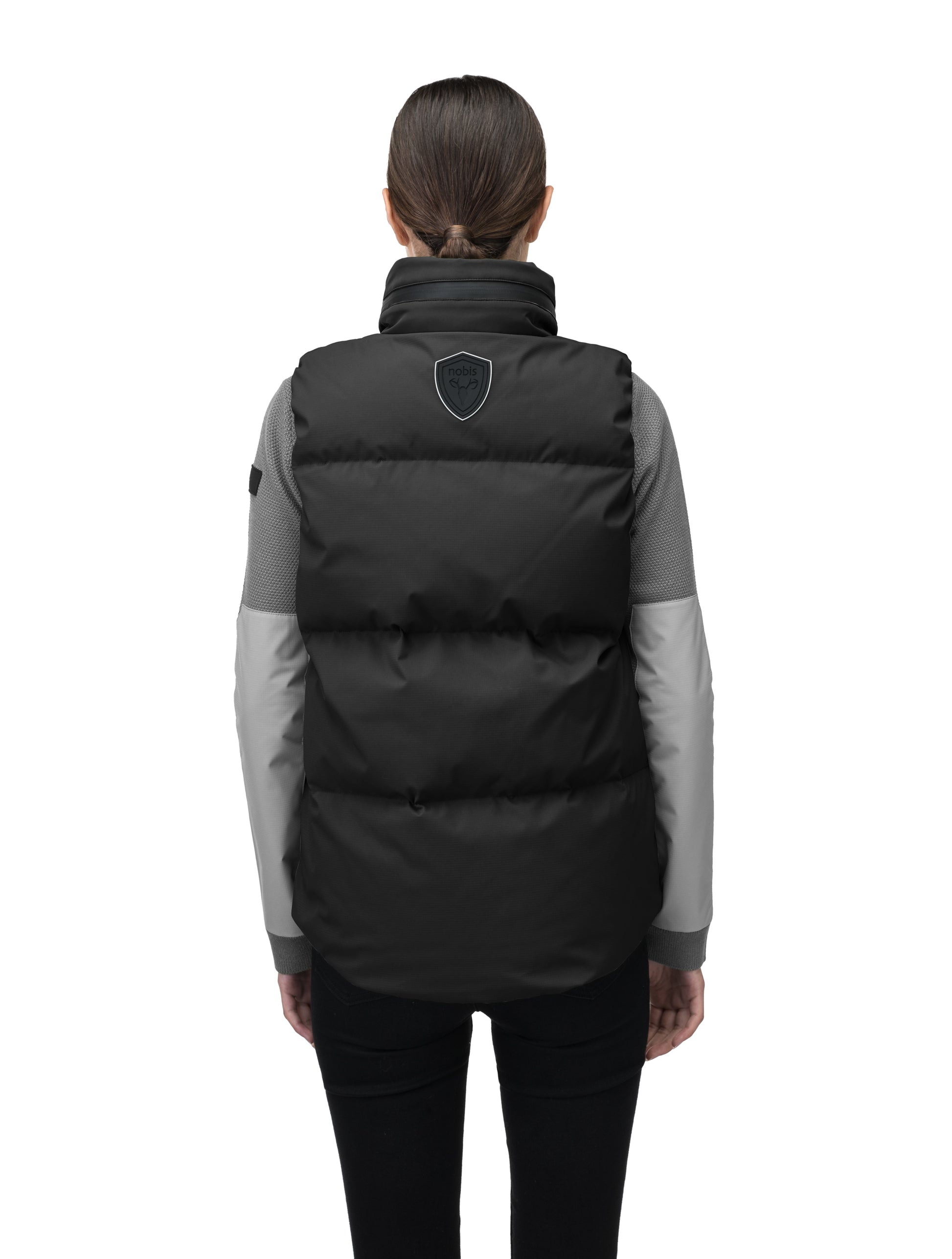 Oren Ladies Performance Vest in hip length, Durable Stretch Ripstop and 3-Ply Micro Denier fabrication, Premium Canadian White Duck Down insulation, tuck-away waterproof hood, and two-way centre front zipper, in Black