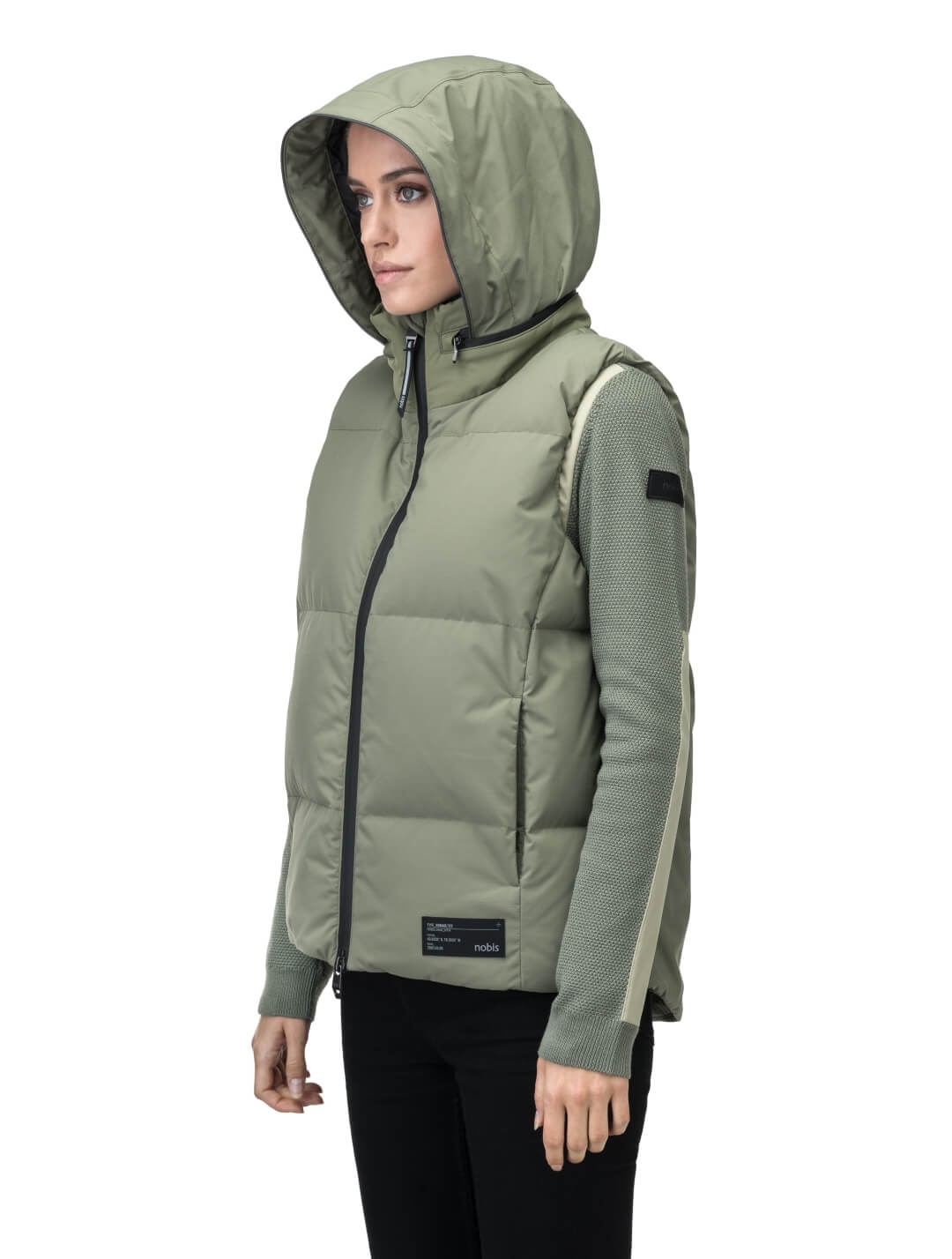 Oren Ladies Performance Vest in hip length, Durable Stretch Ripstop and 3-Ply Micro Denier fabrication, Premium Canadian White Duck Down insulation, tuck-away waterproof hood, and two-way centre front zipper, in Clover