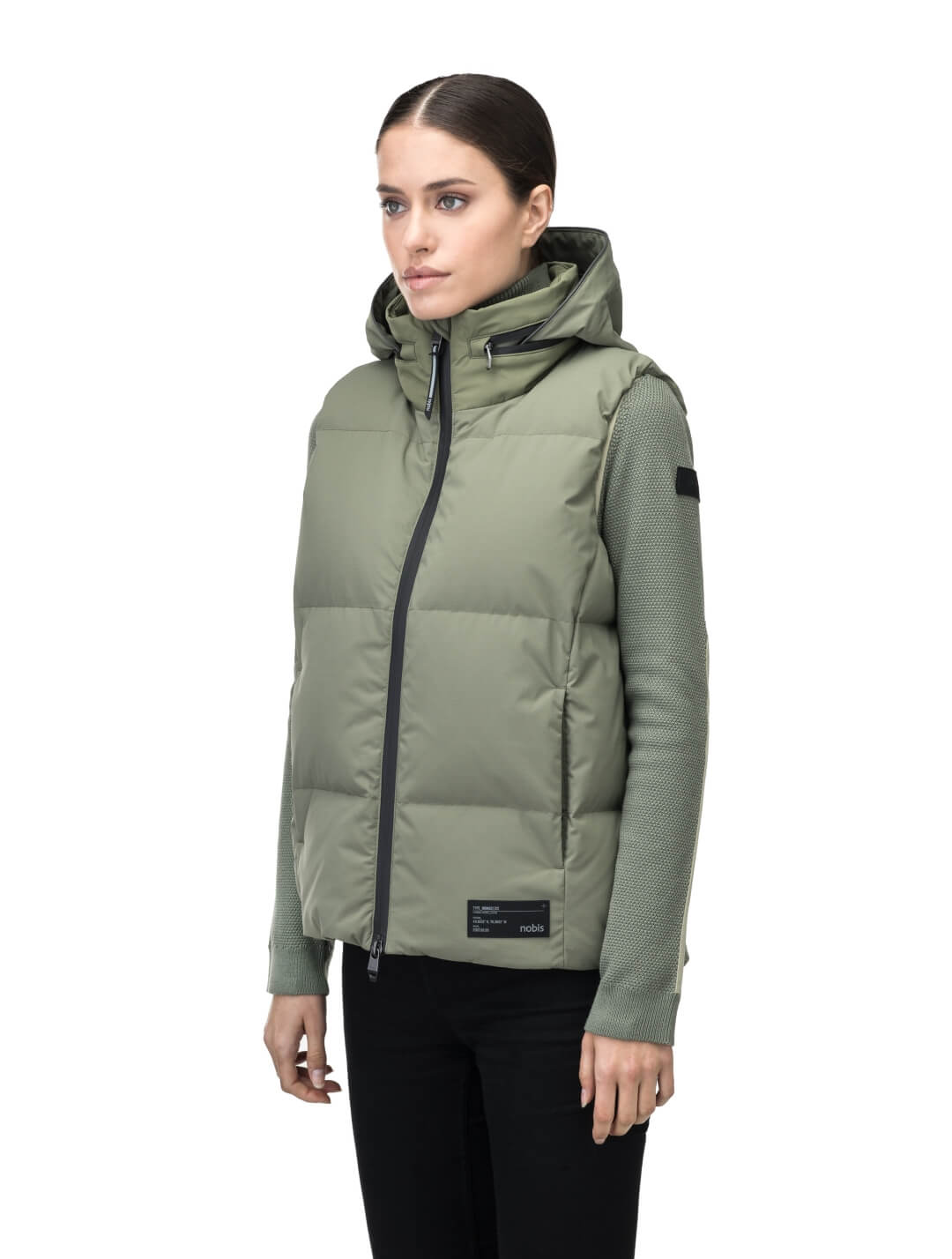 Oren Ladies Performance Vest in hip length, Durable Stretch Ripstop and 3-Ply Micro Denier fabrication, Premium Canadian White Duck Down insulation, tuck-away waterproof hood, and two-way centre front zipper, in Clover