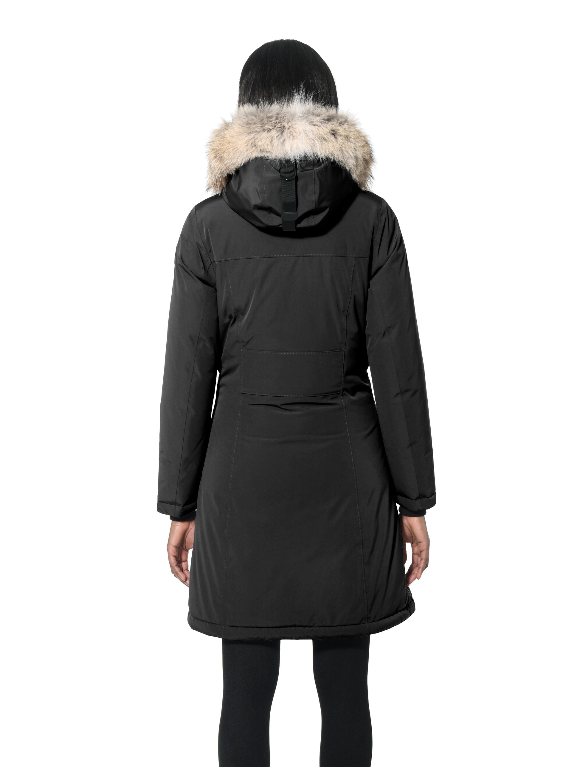 Ladies thigh length down-filled parka with non-removable hood and removable coyote fur trim in Black