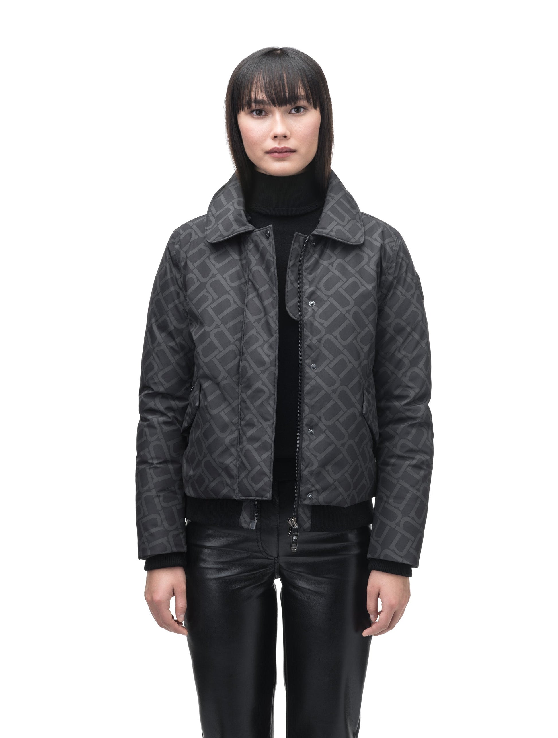 Rae Ladies Aviator Jacket in hip length, Canadian duck down insulation, removable shearling collar with hidden tuckable hood, and two-way front zipper, in Dark Monogram