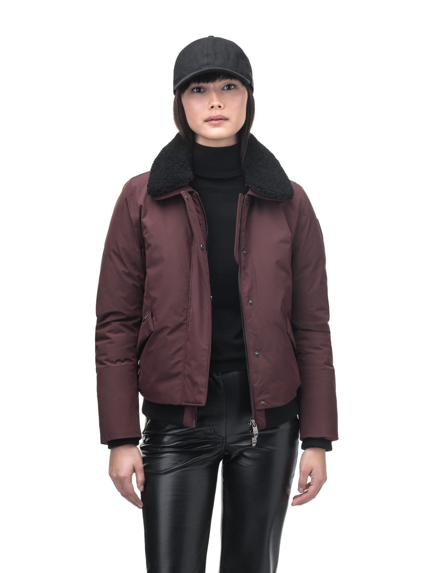 Rae Ladies Aviator Jacket in hip length, Canadian duck down insulation, removable shearling collar with hidden tuckable hood, and two-way front zipper, in Merlot