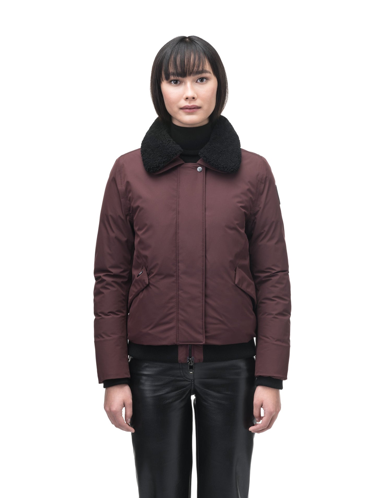 Rae Ladies Aviator Jacket in hip length, Canadian duck down insulation, removable shearling collar with hidden tuckable hood, and two-way front zipper, in Merlot