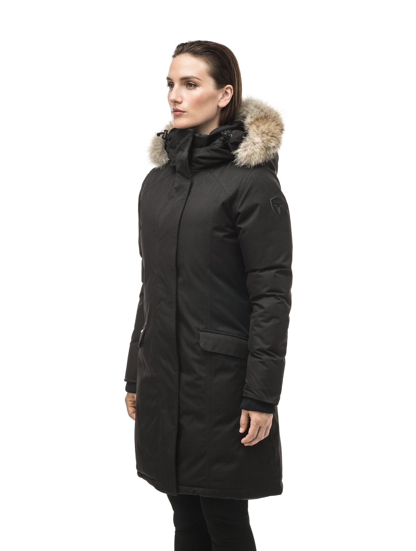 Rebecca Women's Parka in knee length, Canadian duck down insulation, two-way zipper with magnetic front placket, non-removable hood with removable coyote fur trim, in Black