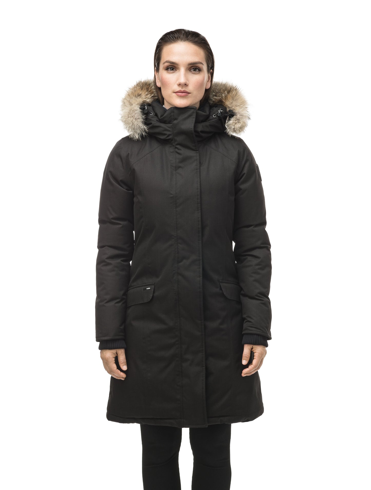 Rebecca Women's Parka in knee length, Canadian duck down insulation, two-way zipper with magnetic front placket, non-removable hood with removable coyote fur trim, in Black