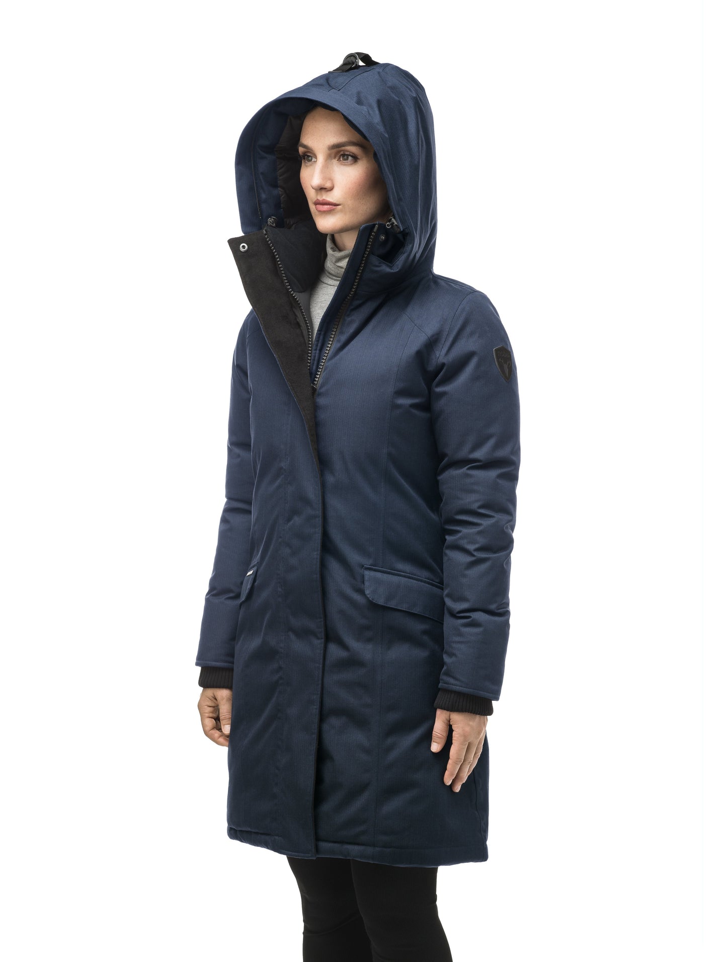 Rebecca Women's Parka in knee length, Canadian duck down insulation, two-way zipper with magnetic front placket, non-removable hood with removable coyote fur trim, in Navy