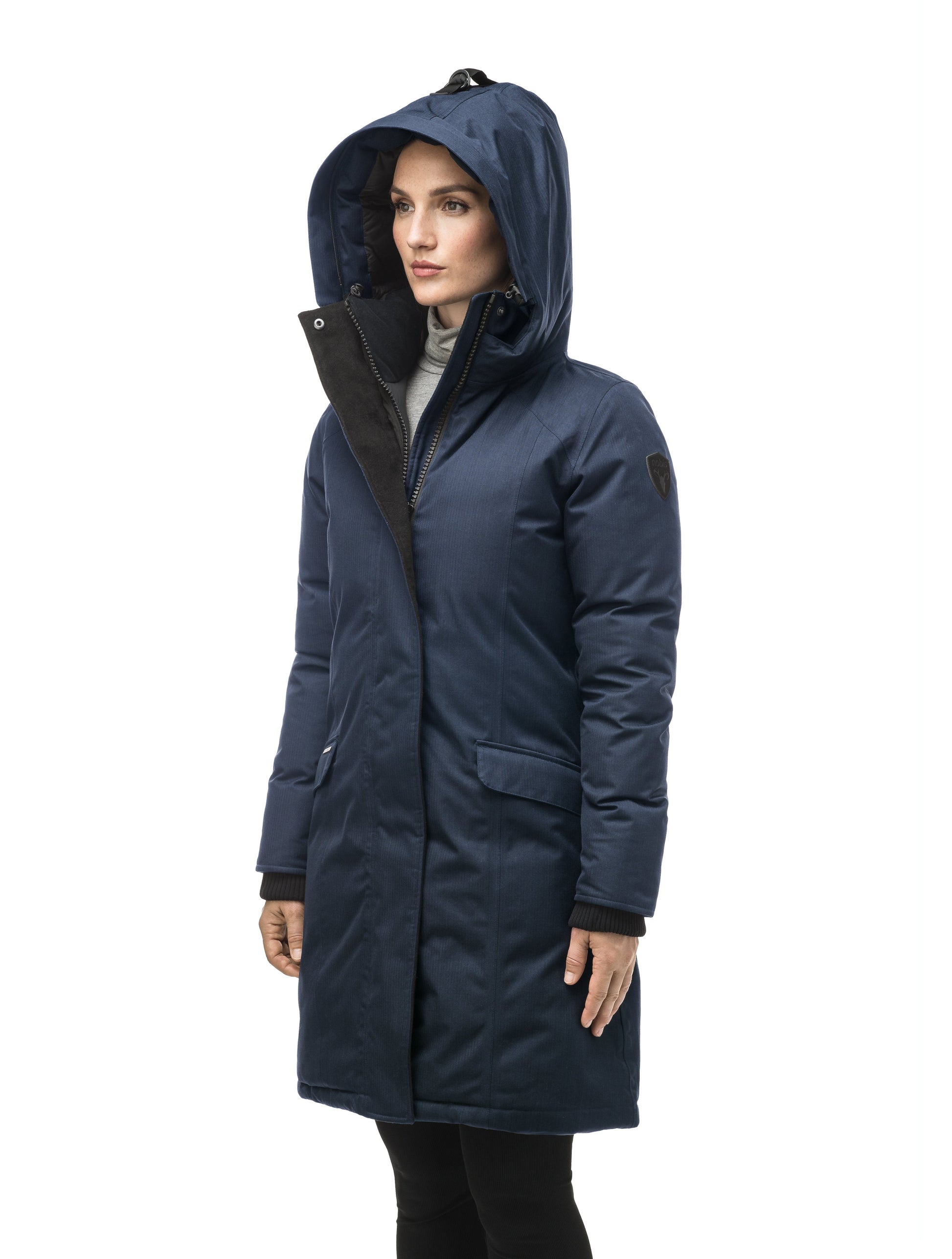 Rebecca Women's Parka in knee length, Canadian duck down insulation, two-way zipper with magnetic front placket, non-removable hood with removable coyote fur trim, in Navy