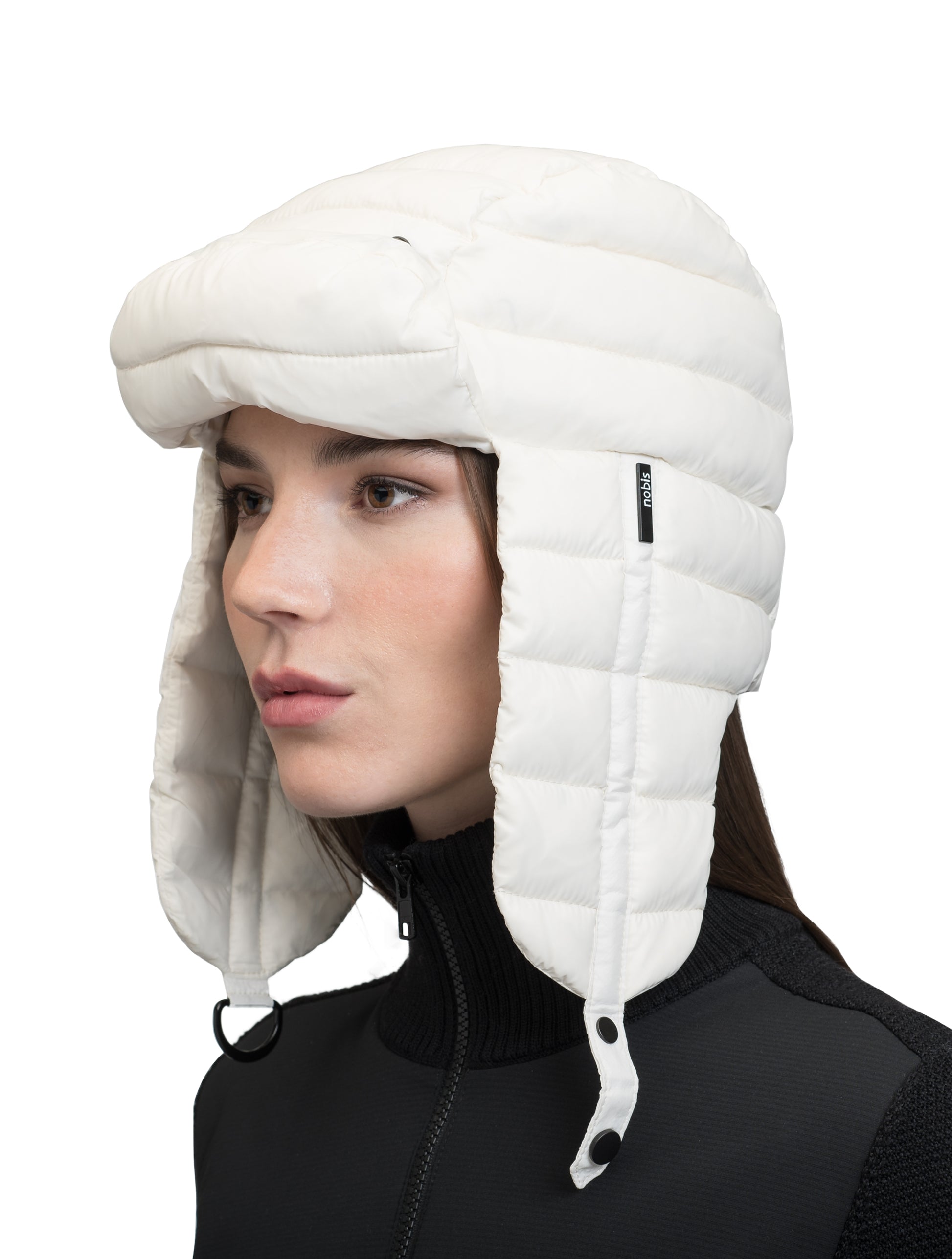 Unisex down-filled quilted fargo hat with adjustable chin strap in Chalk