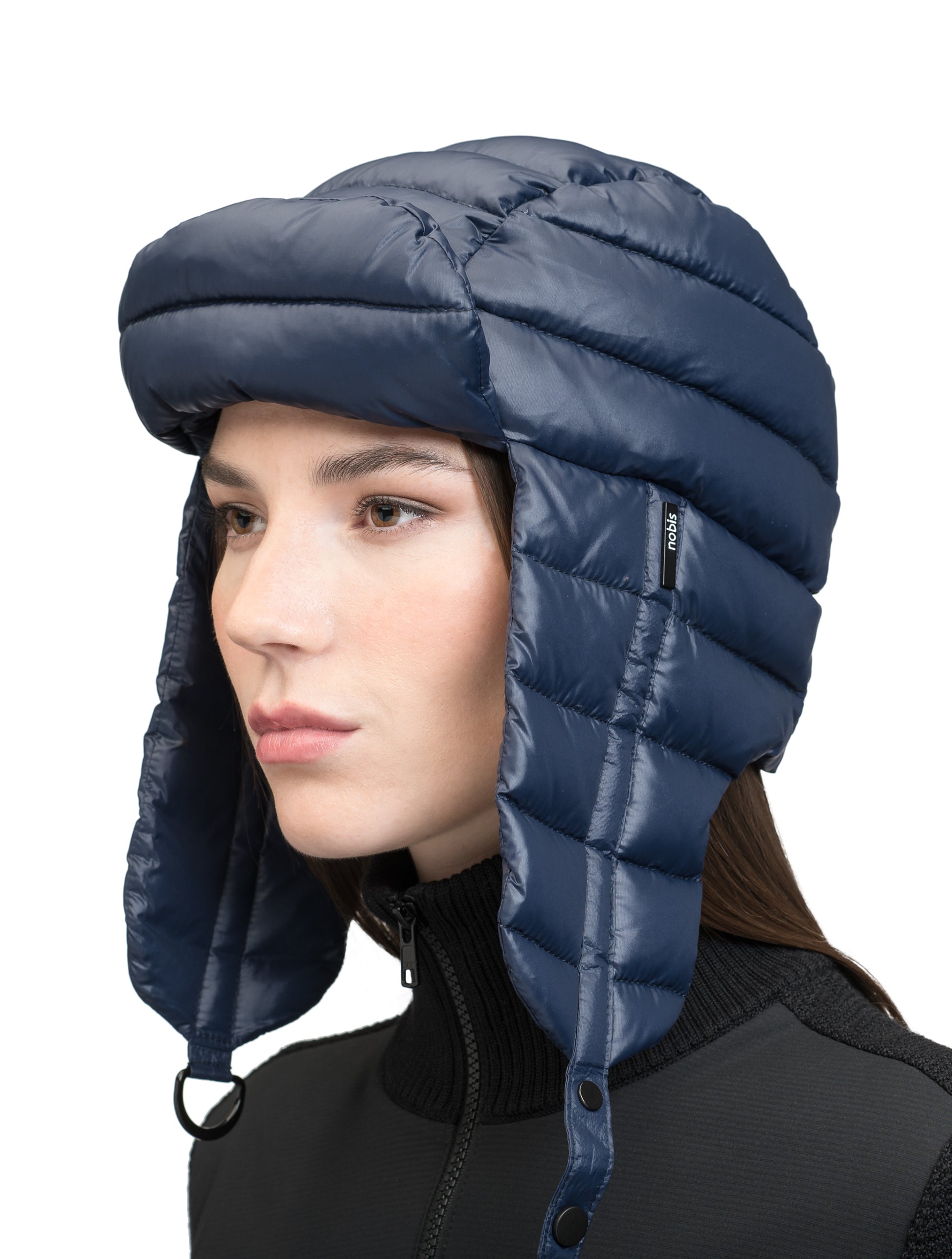 Unisex down-filled quilted fargo hat with adjustable chin strap in Marine