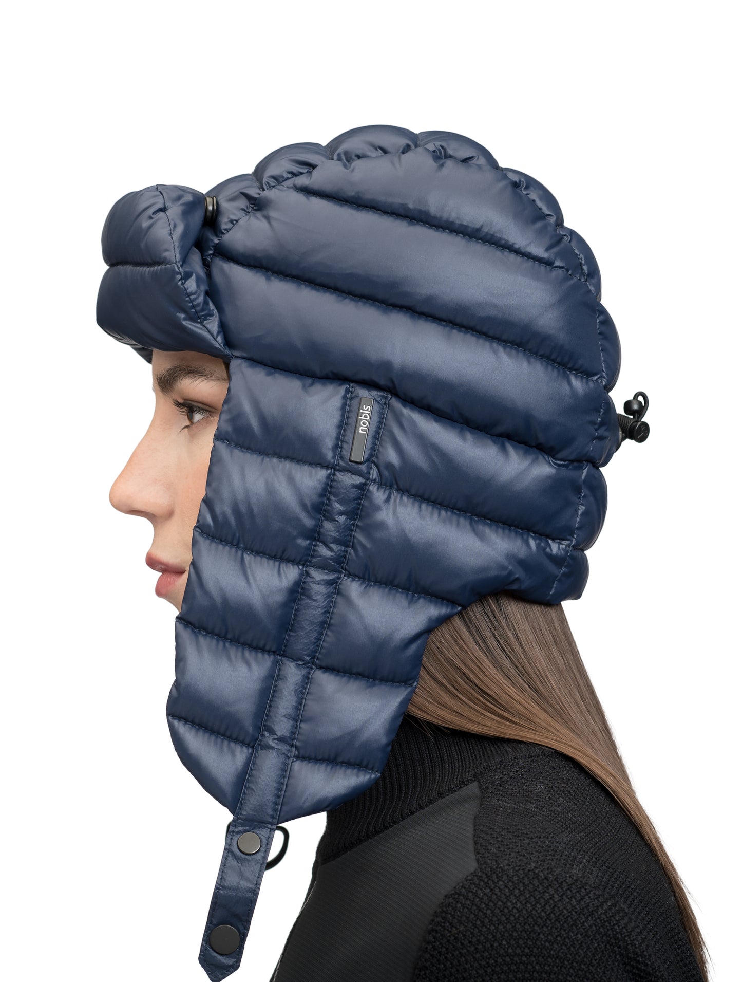 Unisex down-filled quilted fargo hat with adjustable chin strap in Marine