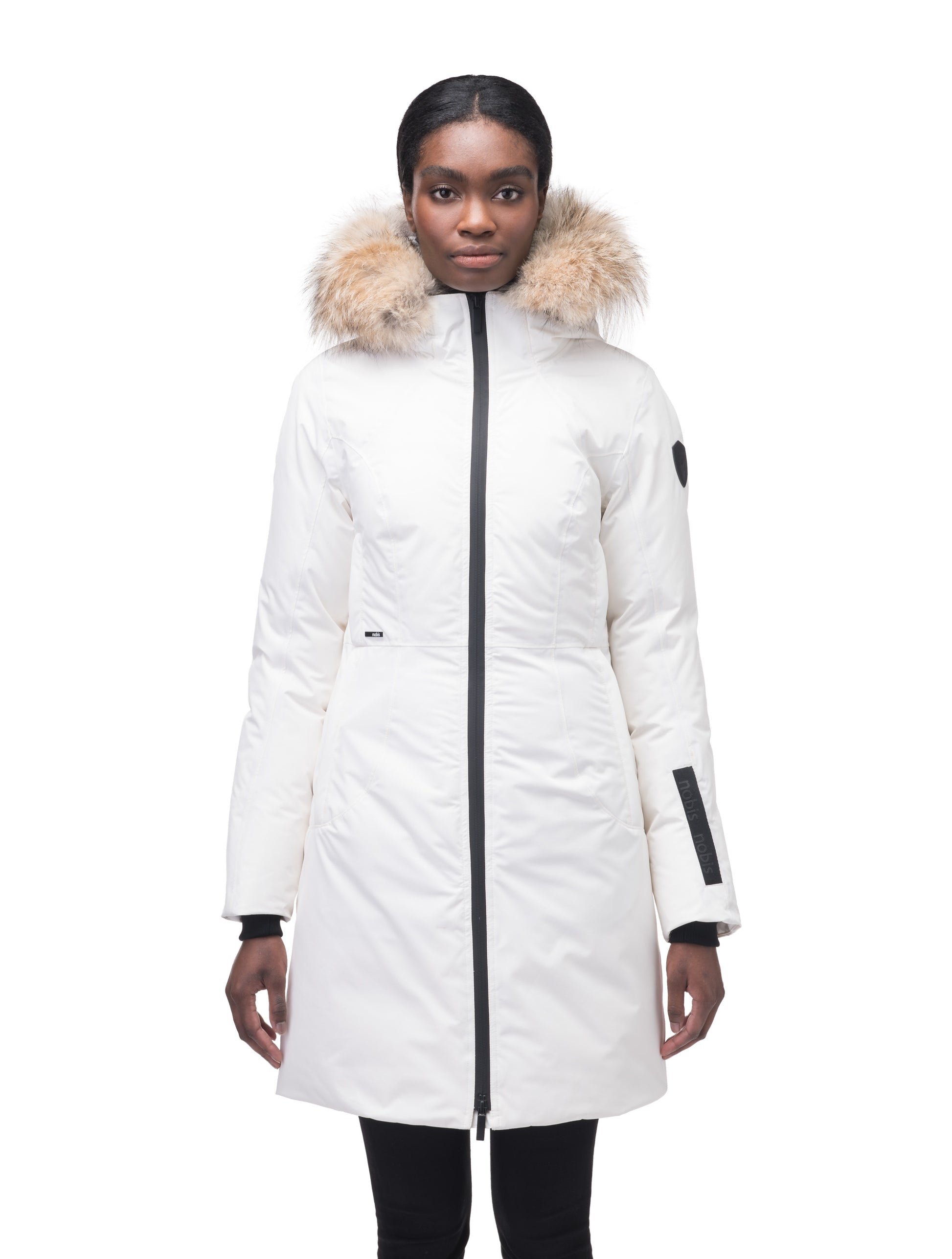 Ladies thigh length down-filled parka with non-removable hood and removable coyote fur trim in Chalk