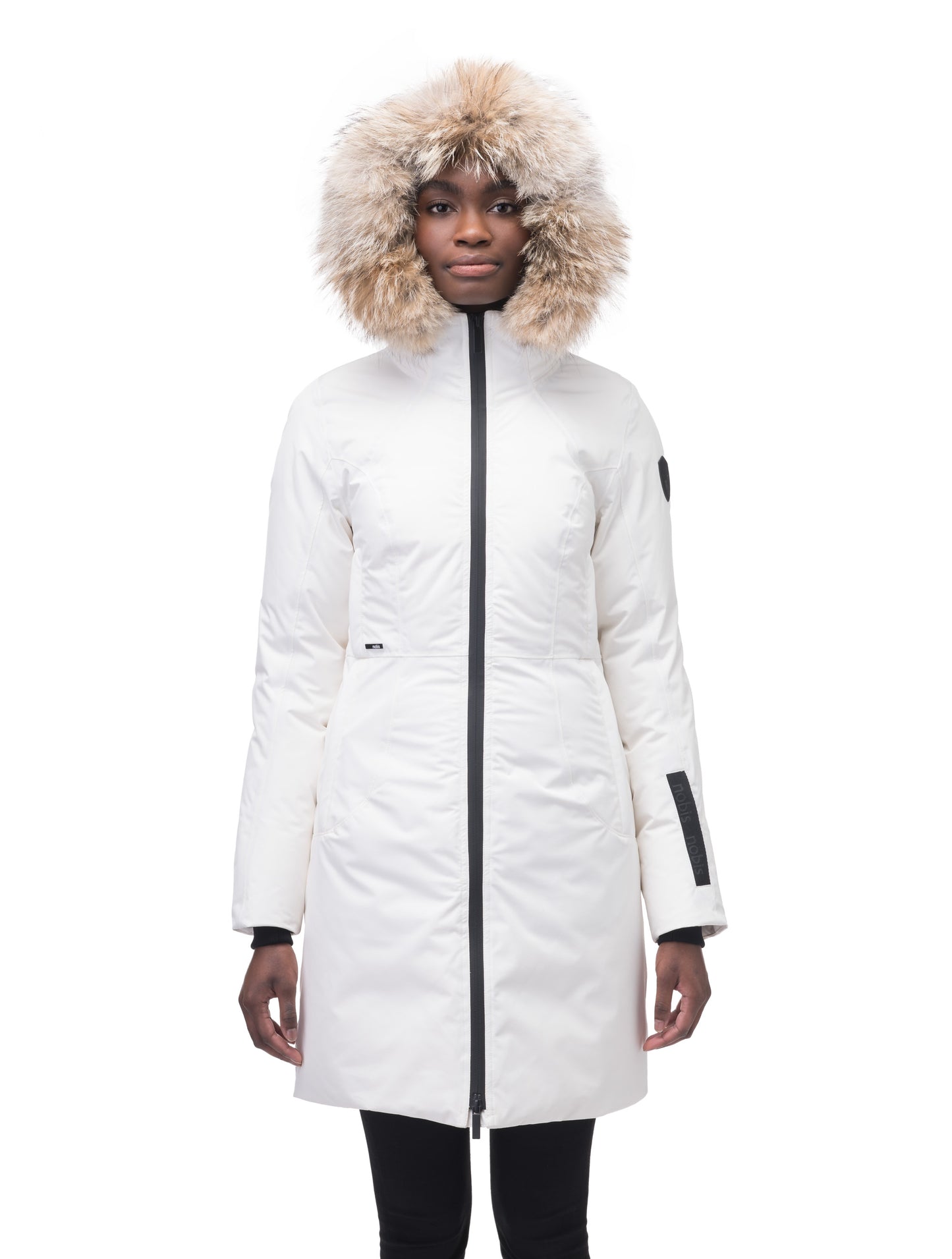 Ladies thigh length down-filled parka with non-removable hood and removable coyote fur trim in Chalk