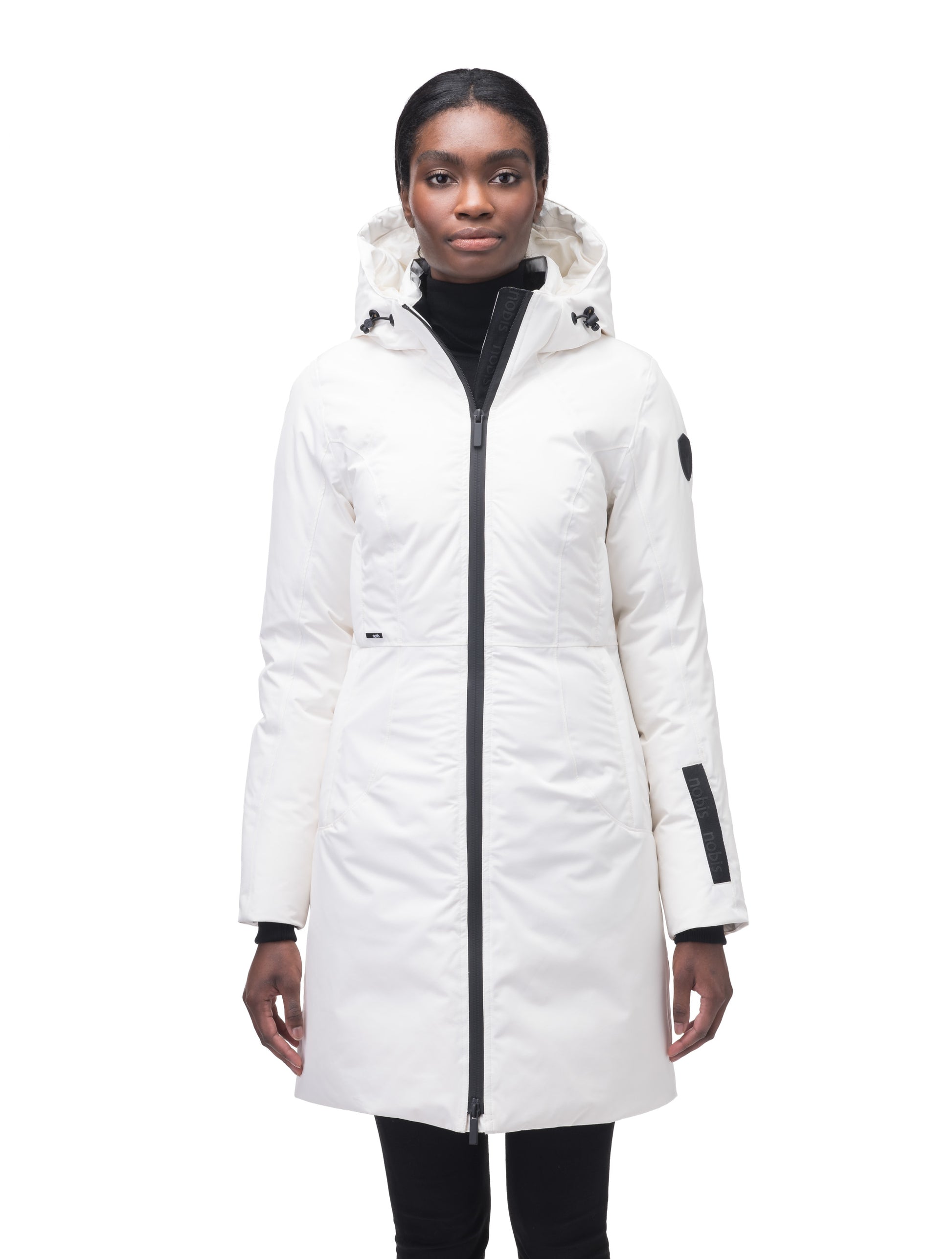 Ladies thigh length down-filled parka with non-removable hood and removable coyote fur trim in Chalk