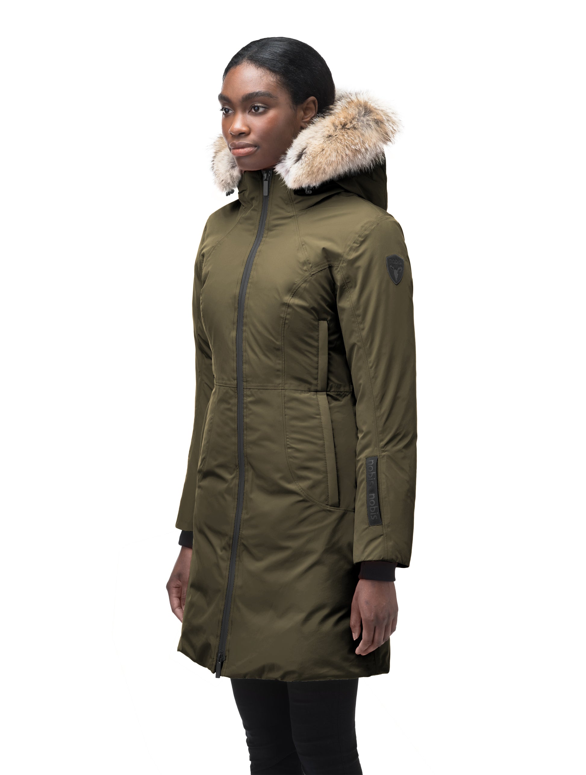 Ladies thigh length down-filled parka with non-removable hood and removable coyote fur trim in Fatigue