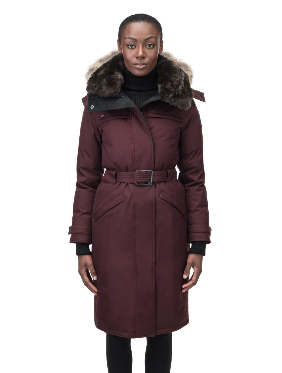 Women's knee length down filled parka with a belted waist and fully removable Coyote and Rex Rabbit fur ruffs in Merlot