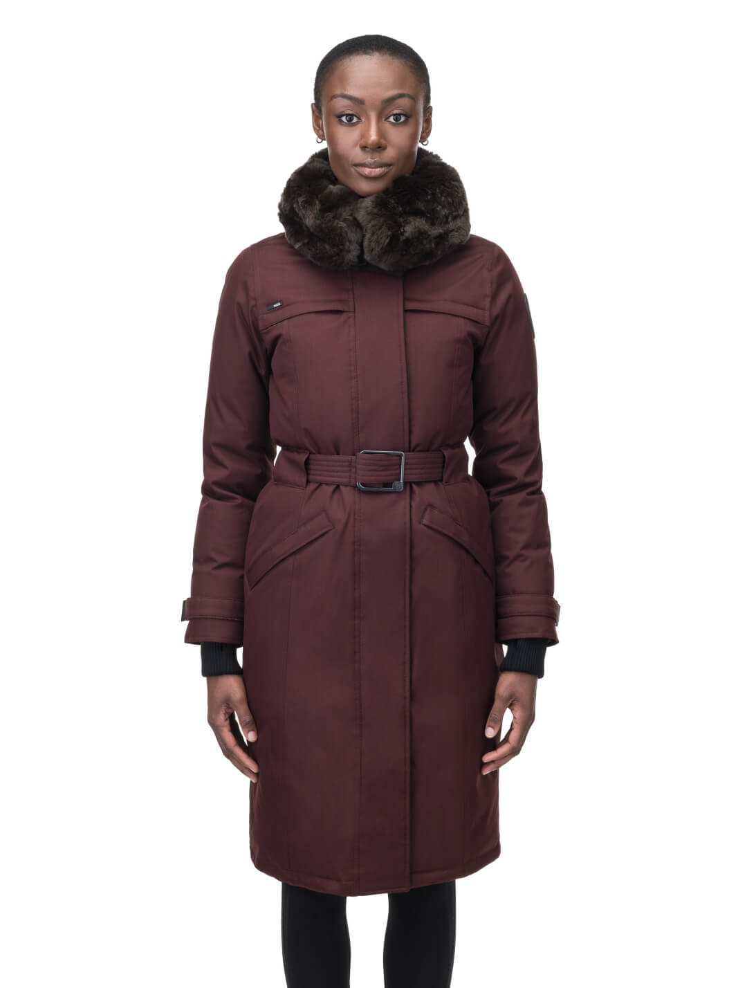 Women's knee length down filled parka with a belted waist and fully removable Coyote and Rex Rabbit fur ruffs in Merlot