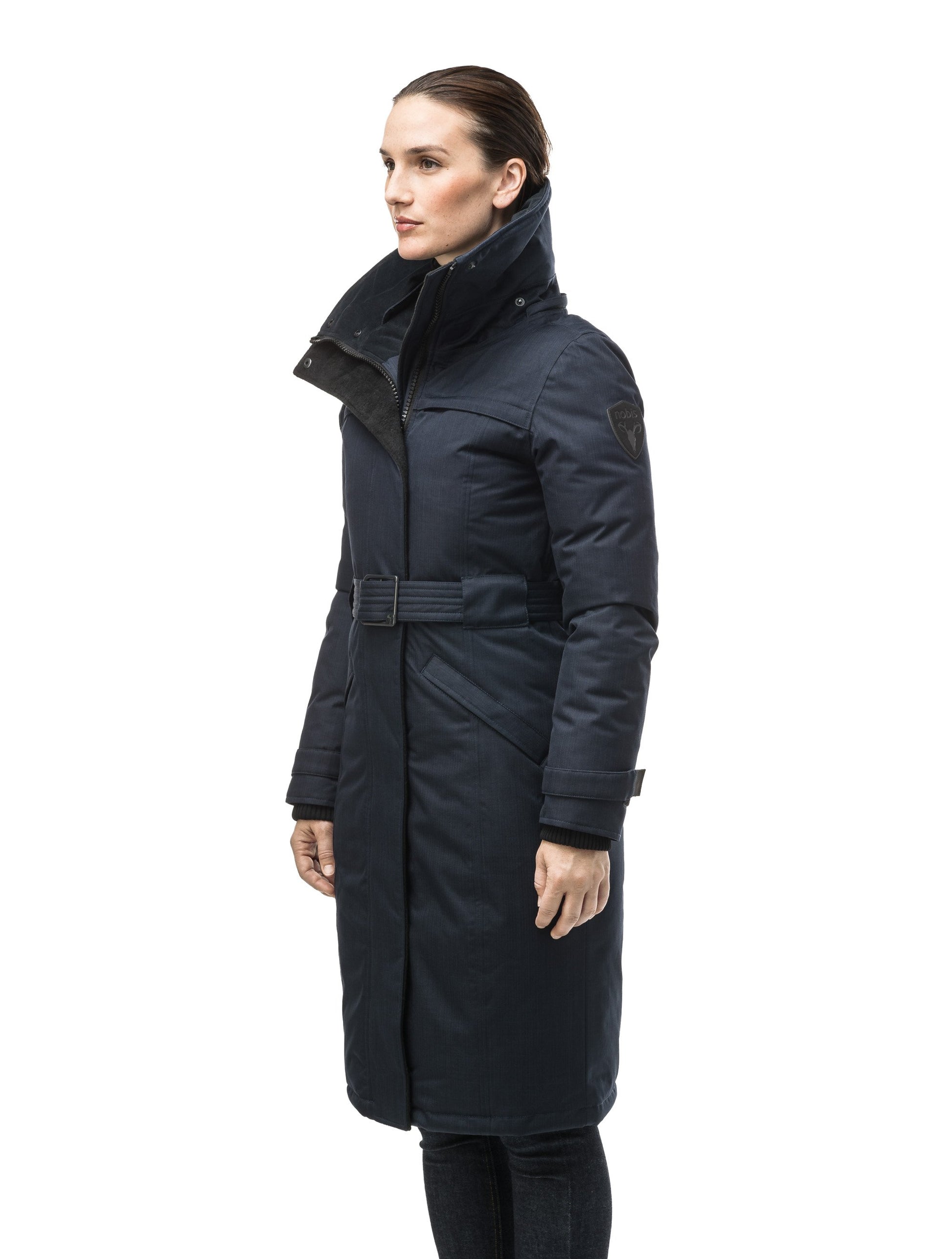 Women's knee length down filled parka with a belted waist and fully removable Coyote and Rex Rabbit fur ruffs in CH Navy