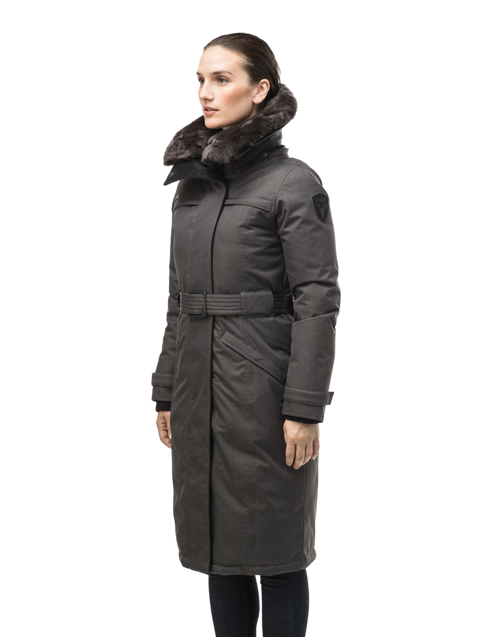 Women's knee length down filled parka with a belted waist and fully removable Coyote and Rex Rabbit fur ruffs in CH Steel Grey