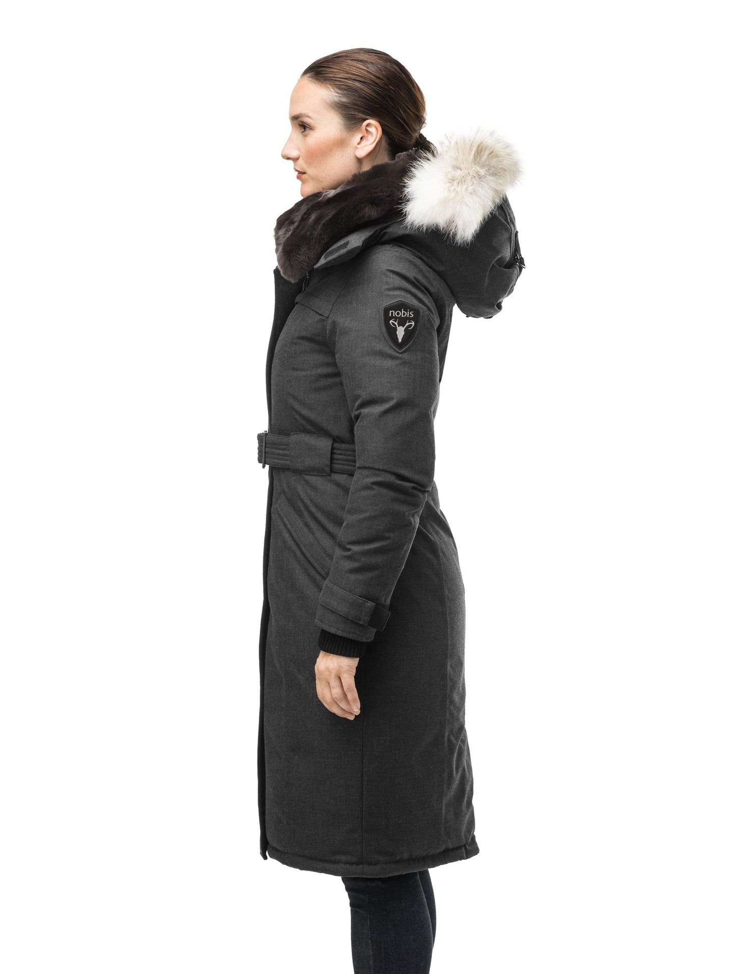 Women's knee length down filled parka with a belted waist and fully removable Coyote and Rex Rabbit fur ruffs in H. Black