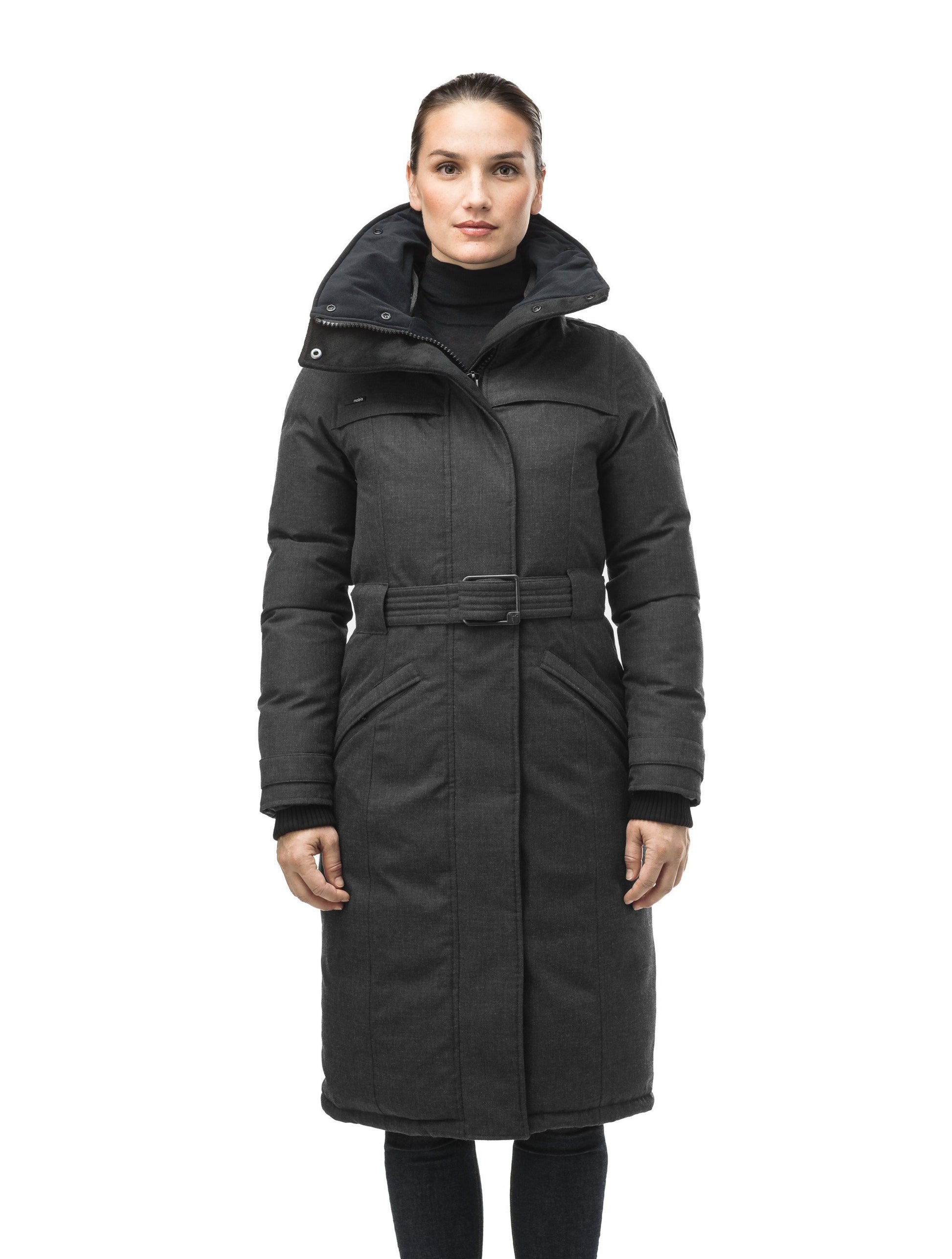 Women's knee length down filled parka with a belted waist and fully removable Coyote and Rex Rabbit fur ruffs in H. Black