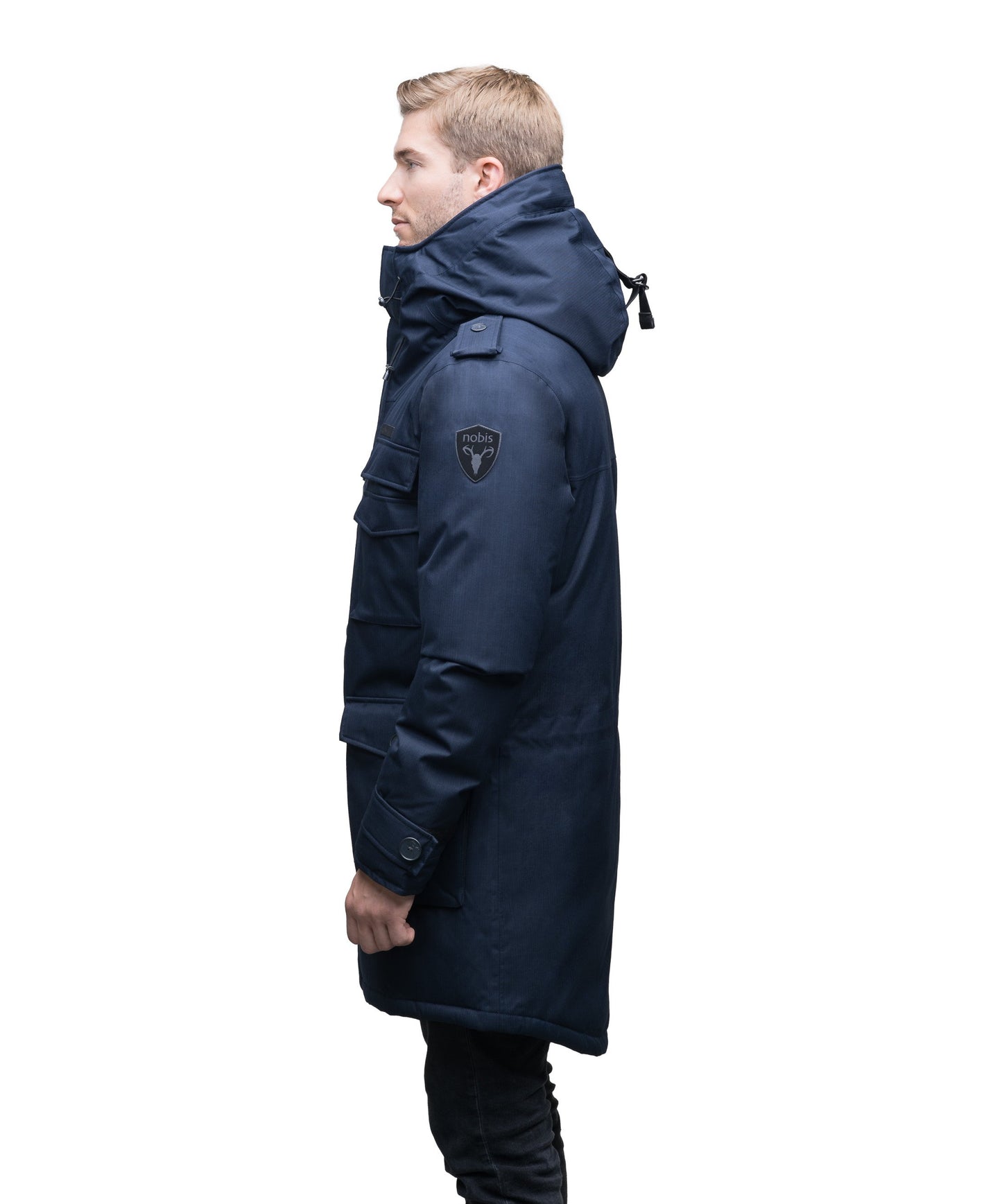 Men's down filled parka with faux button magnet closures and fur free hood with a fishtail hemline in CH Navy