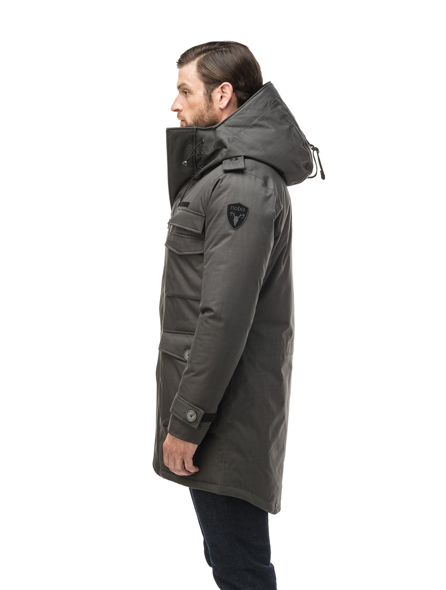 Men's down filled parka with faux button magnet closures and fur free hood with a fishtail hemline in Steel Grey