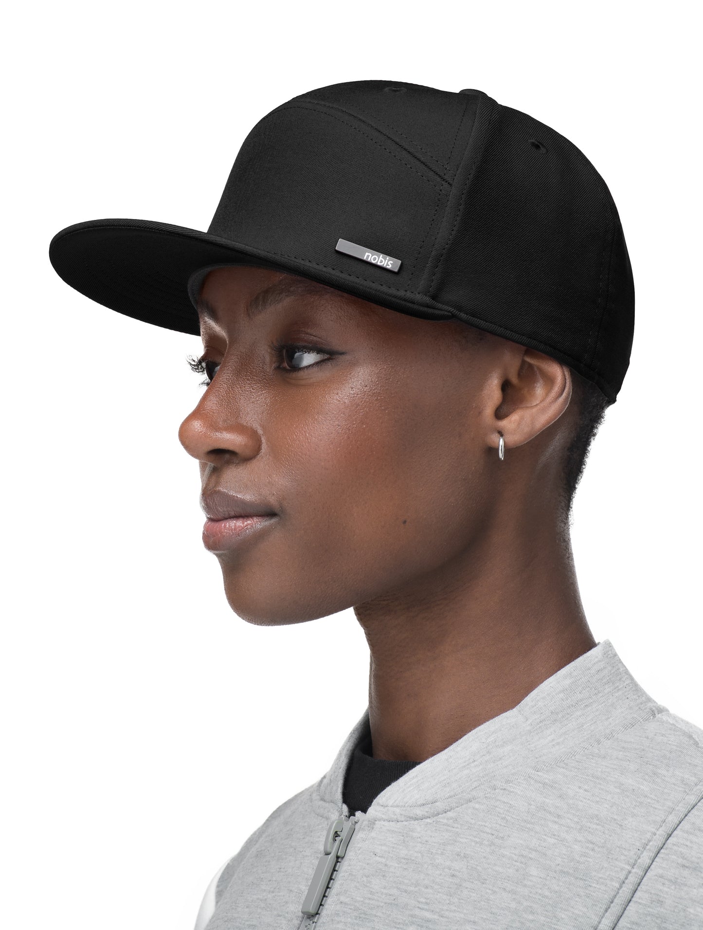 Unisex 7-panel snapback hat with flat brim and structured crown in Black