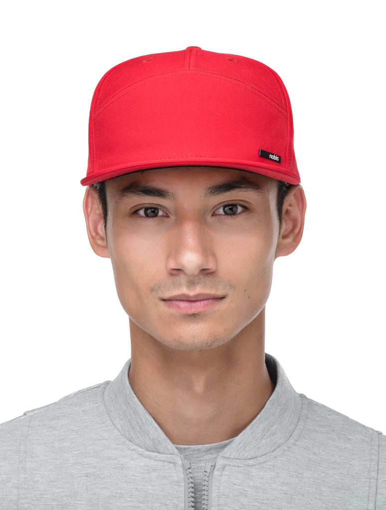 Unisex 7-panel snapback hat with flat brim and structured crown in Red