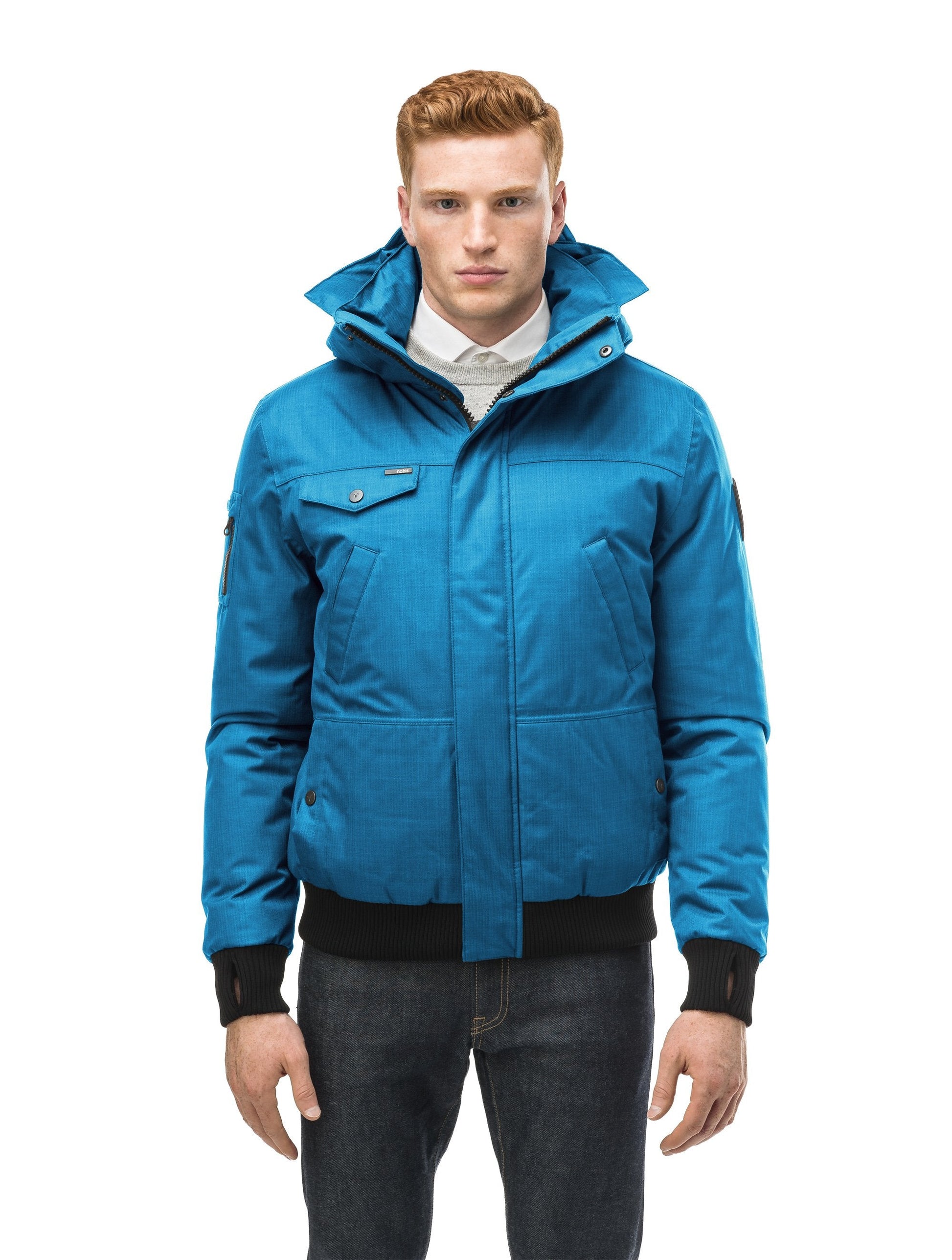 Men's sleek down filled bomber jacket with clean details and a fur free hood in Sea Blue