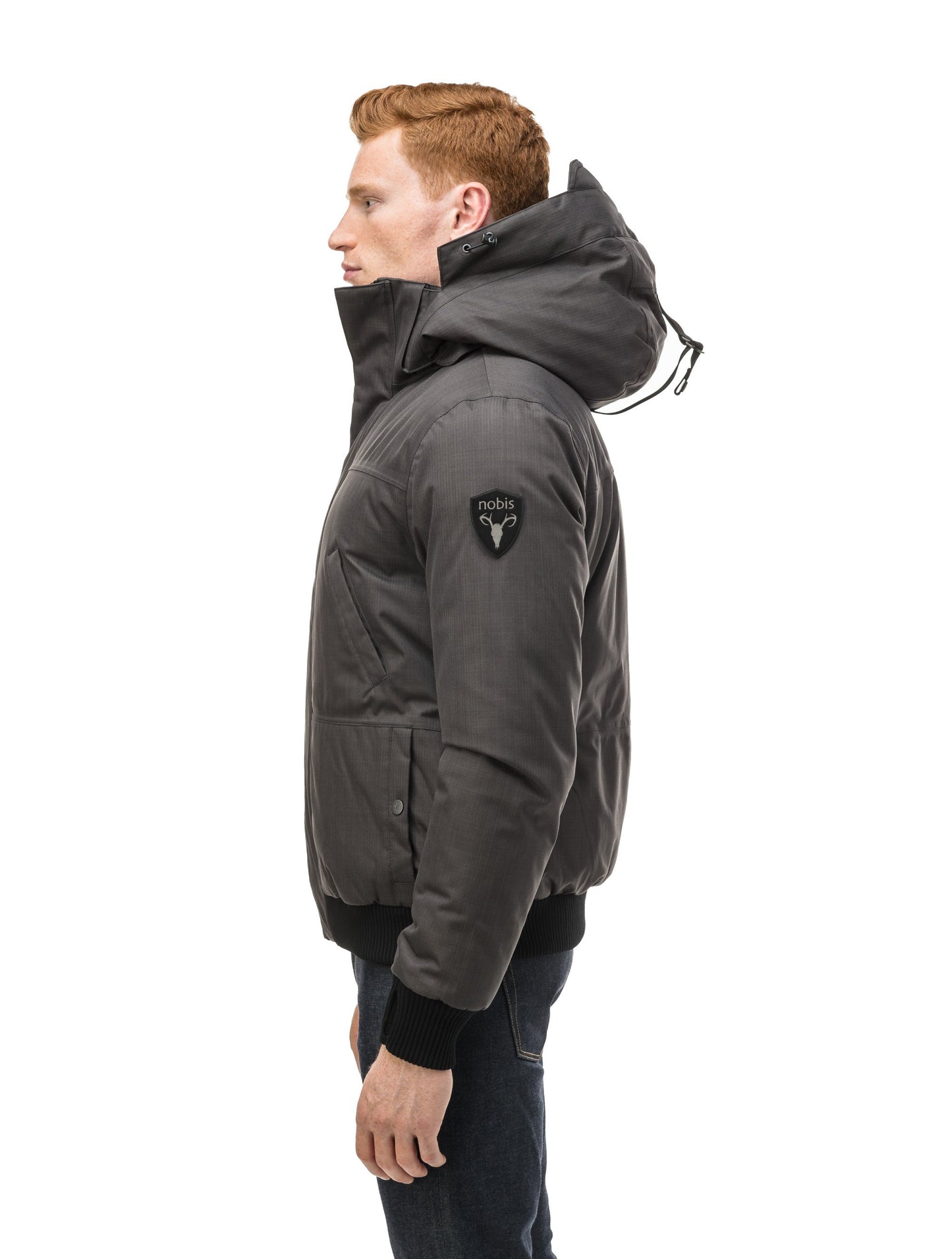 Men's sleek down filled bomber jacket with clean details and a fur free hood in CH Steel Grey